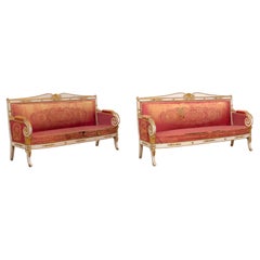 Pareja de Sofás Italianos del S. XIX Decorados en Madera Dorada y Pintura con Brazos en Volutas