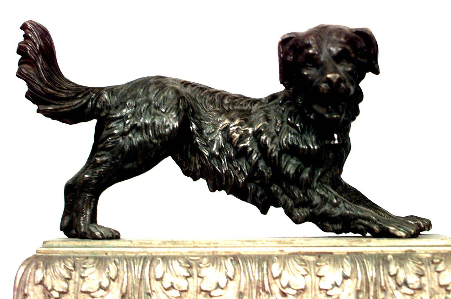 Pair of French (19th Century) andirons composed of bronze terriers posing upon rectangular bronze dore rectangular bases. (PRICED AS Pair)
