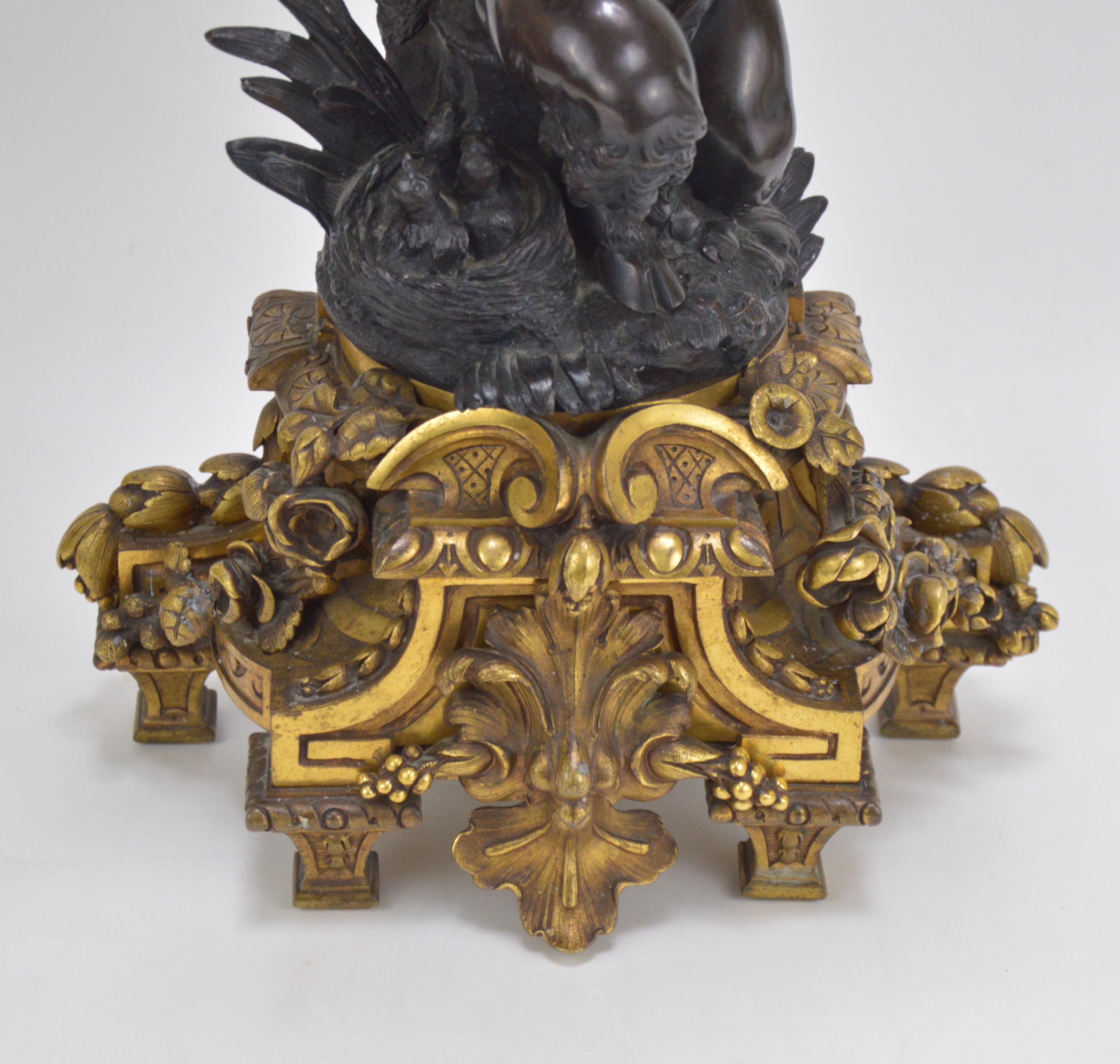 Pair of bronze candelabra representing fauns in patinated bronze holding a small owl and a baby bird. Napoleon III style decoration, mid-19th century.
Measures: Height 83 cm.