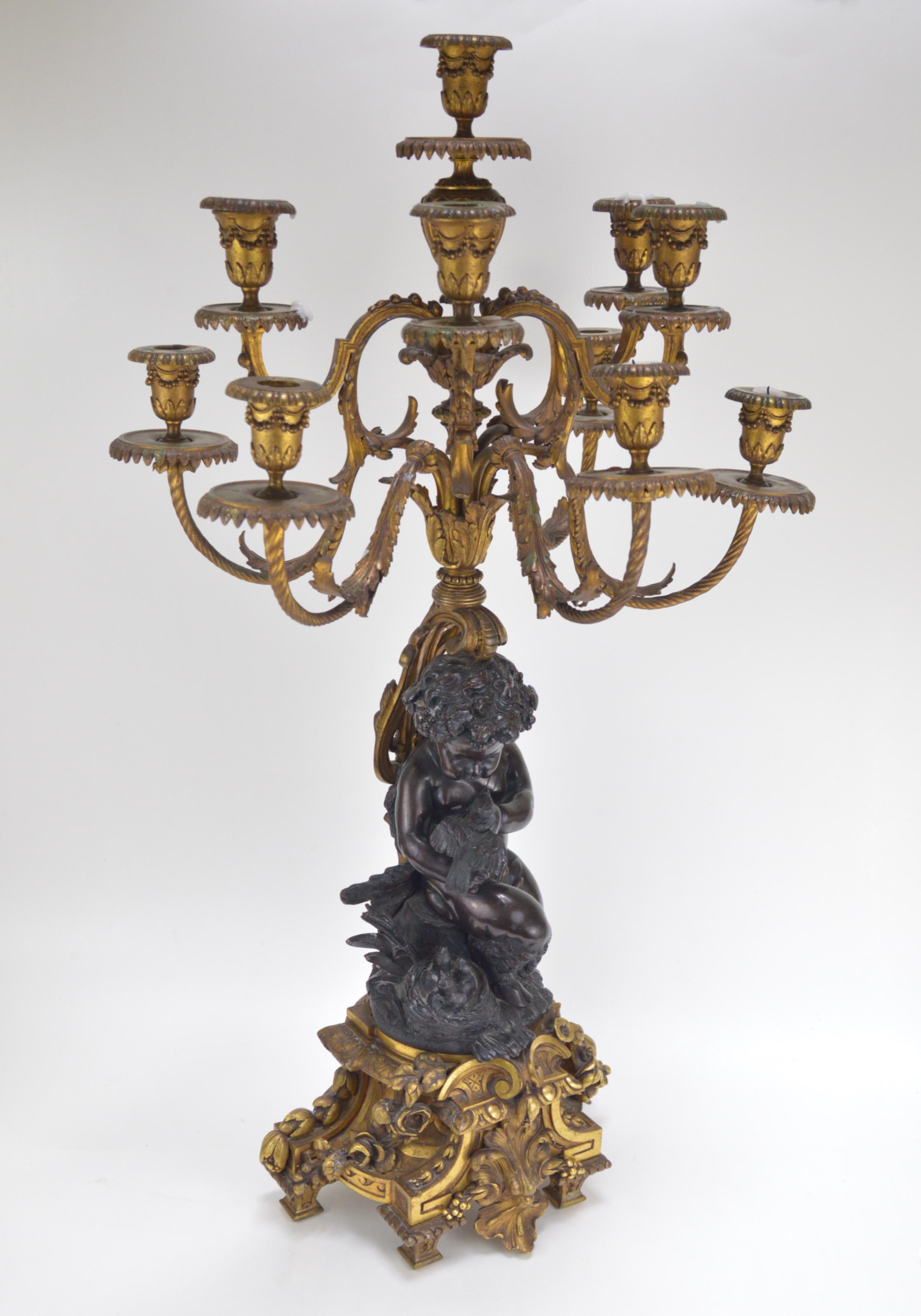 Mid-19th Century Pair of 19th Century Patinated and Gilt Bronze Candelabra Representing Fauns