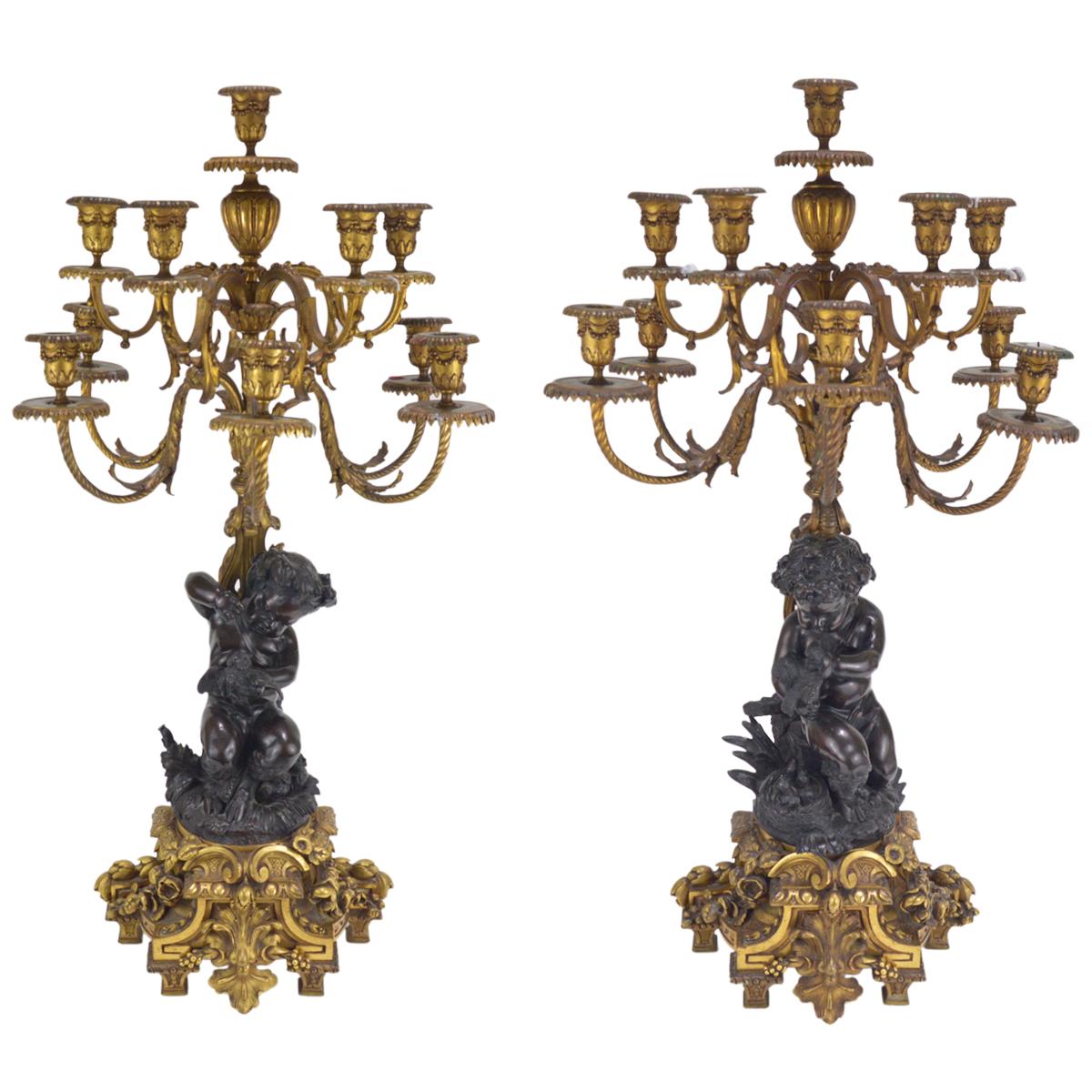 Pair of 19th Century Patinated and Gilt Bronze Candelabra Representing Fauns