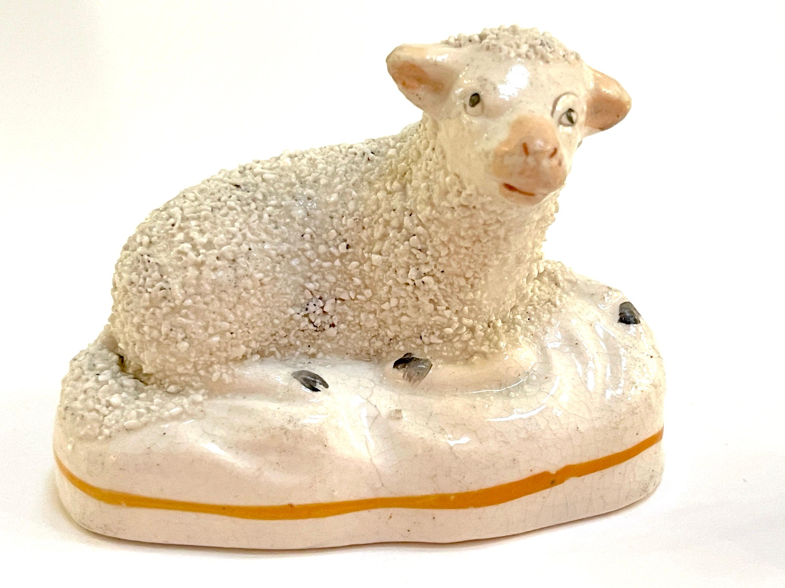 English Pair of 19th Century Staffordshire Figures of Recumbent Sheep For Sale