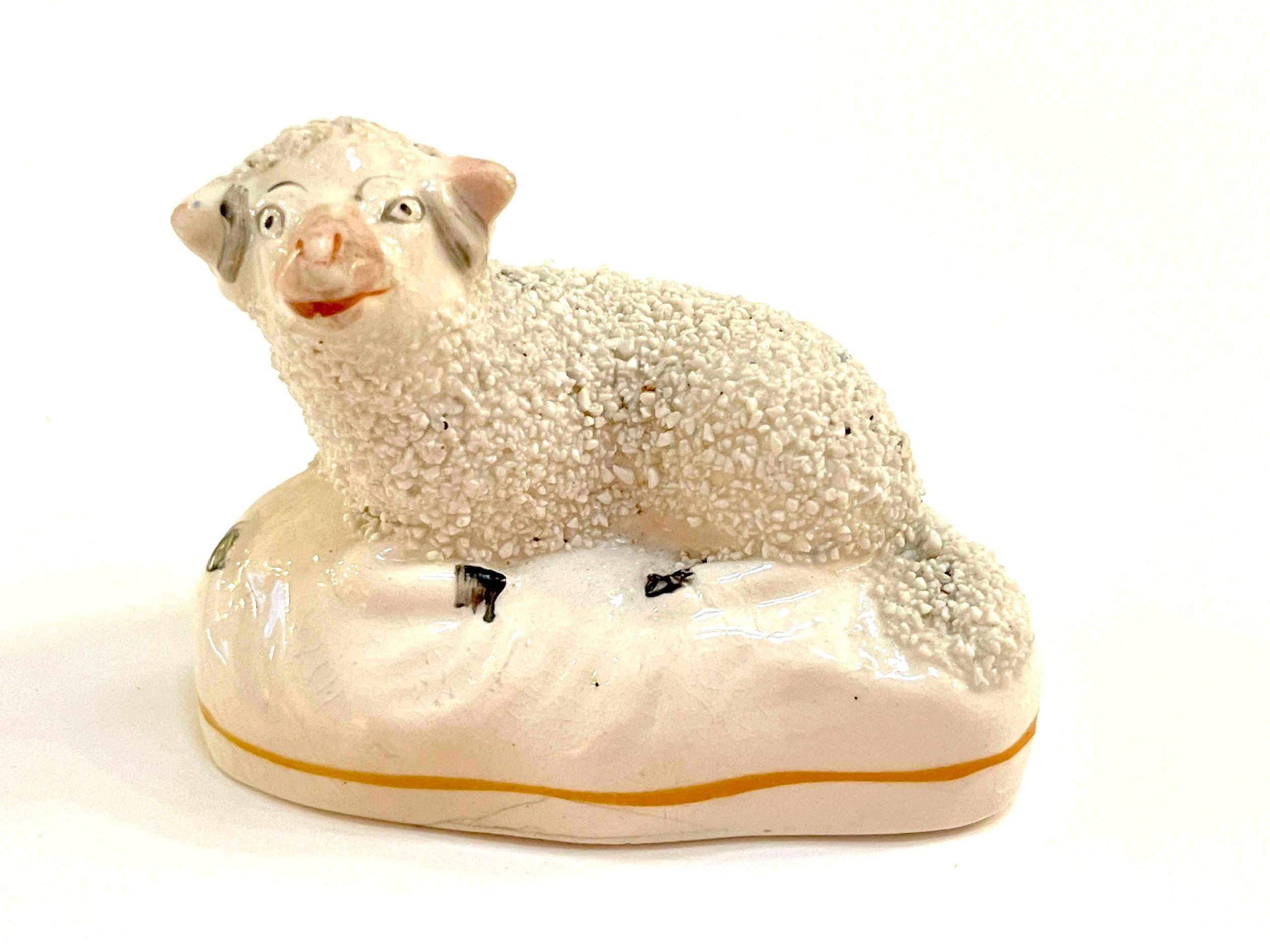 Hand-Painted Pair of 19th Century Staffordshire Figures of Recumbent Sheep For Sale