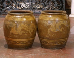 Pair of 19th C. Thai Glazed Earthenware Dragon Jars with Sunburst Motifs
