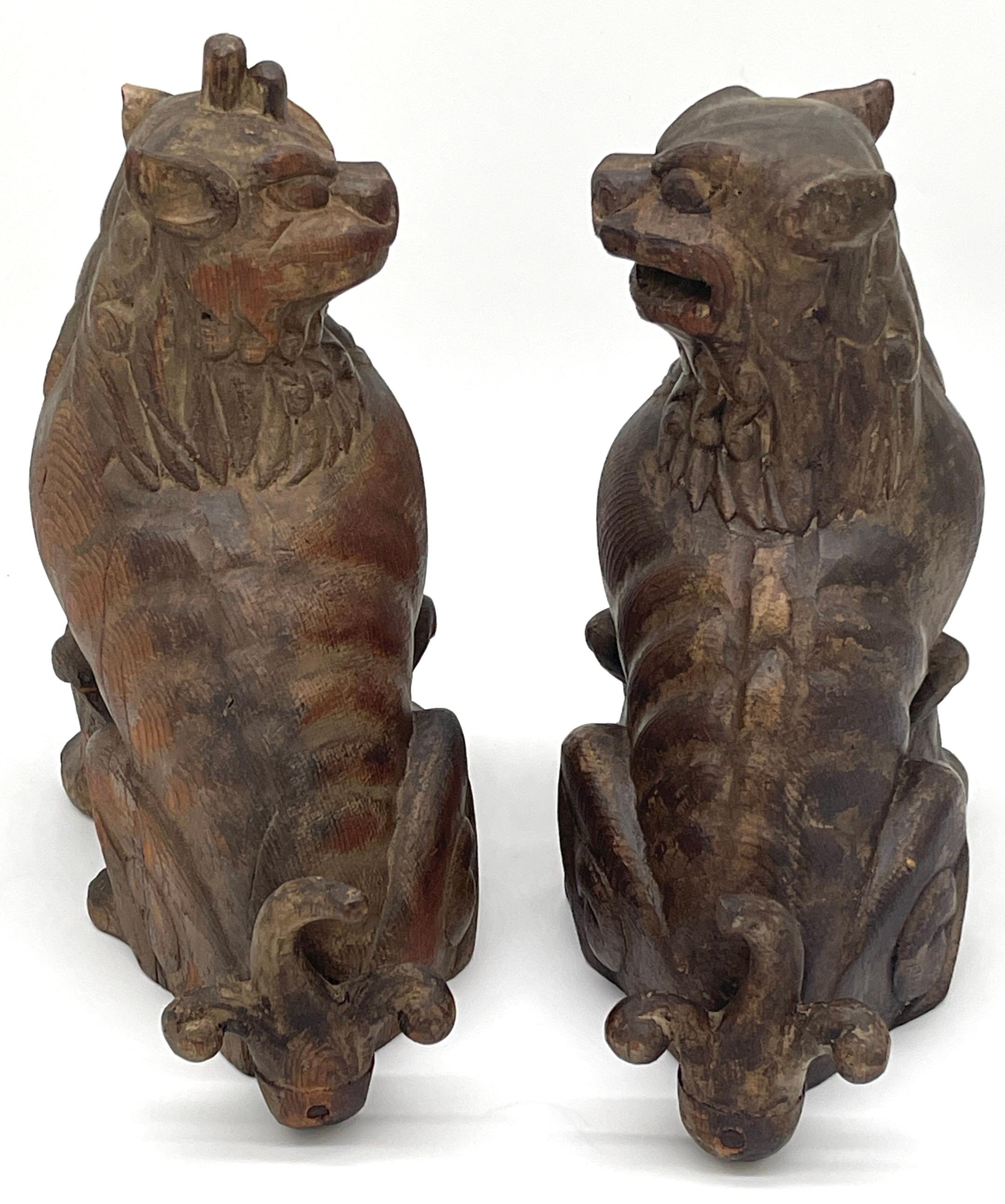 Pair of 19th C. Tibetan Carved Wood  & Polychromed  Foo/ Guardian /Temple Dogs  In Good Condition For Sale In West Palm Beach, FL