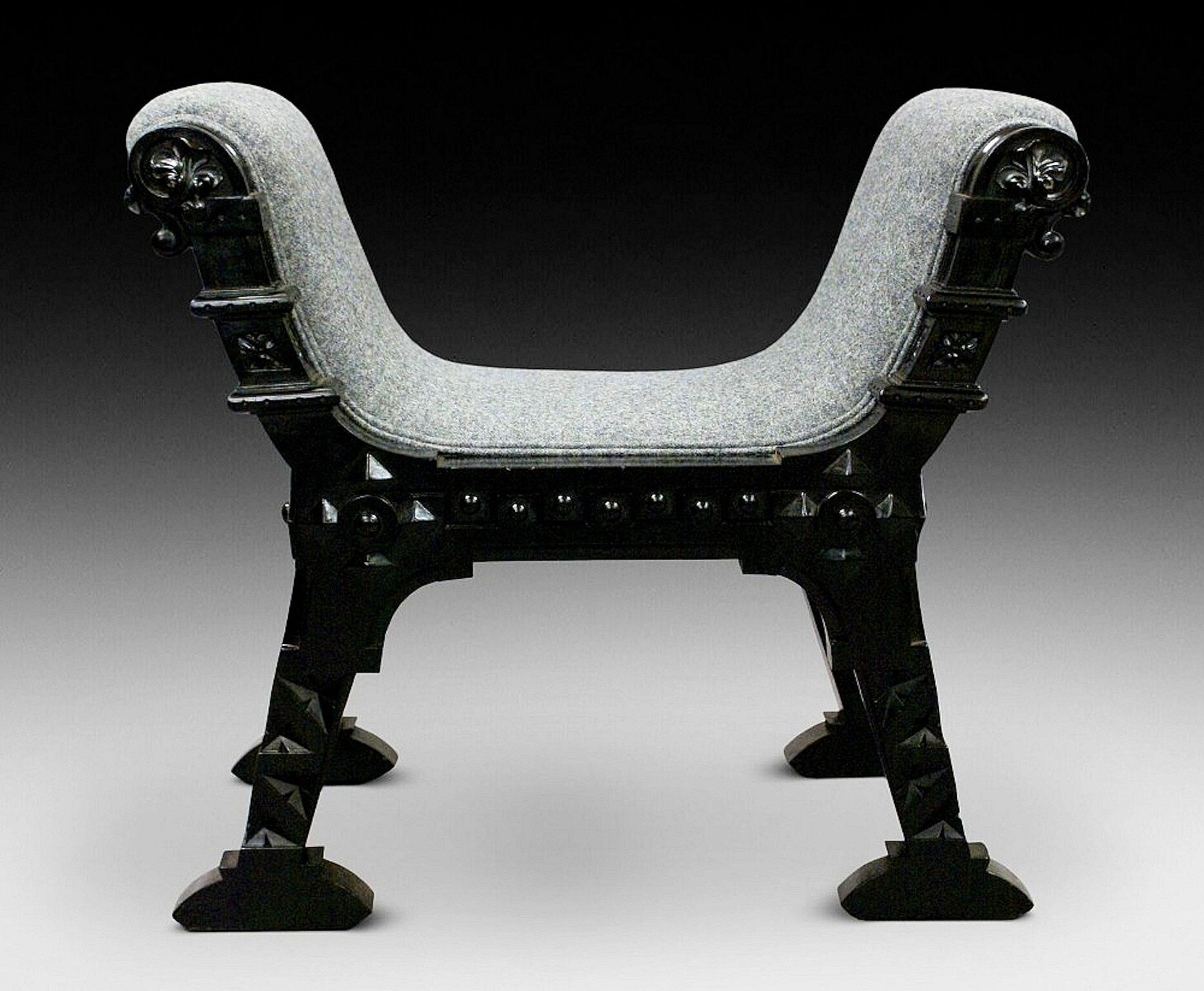 This beautiful pair of 19th C. Ebonised hardwood window seats follow the Aesthetic movement in style and design. They showcase a strong and bold design style, and have been recently reupholstered in a soft grey wool fabric. Each seat measures 31 1/2