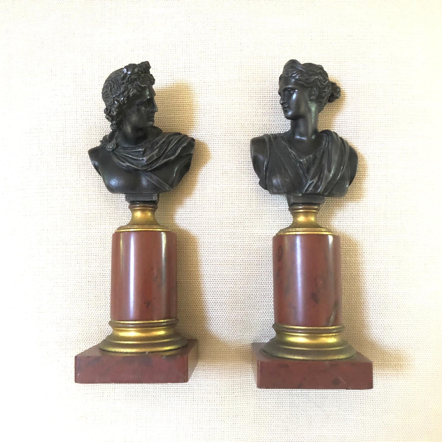 Pair of marble and bronze Neo Classical Grand Tour decorative sculptures, w Bronze busts of Diane and Apollo , standing on Red Marble columns & bases w. gilt Bronze mounts.

Both signed w. Foundry Gladenbeck on back. 
Finest quality casting and