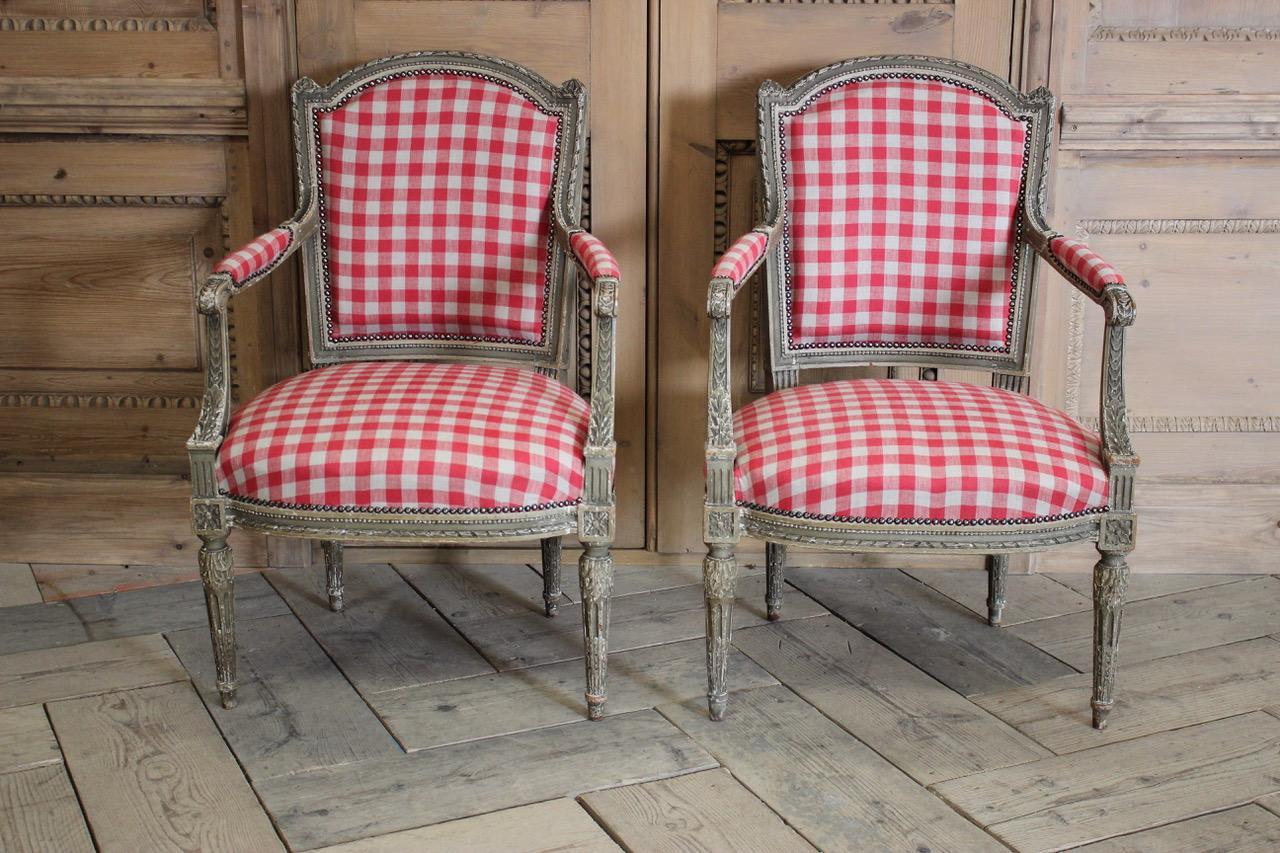 A very elegant pair of late 19th century French painted fauteuils in the Louis XVI taste, retaining the original paint and having been reupholstered by us in a check linen.
Measurements: 43 cms (seat height)
France, circa 1880-1900.