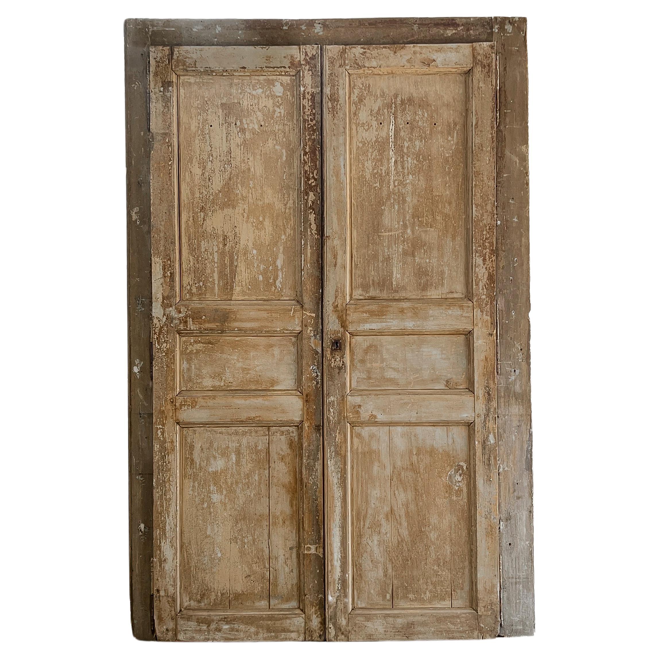 Pair of 19th Century 3 Panel French Doors in Casing