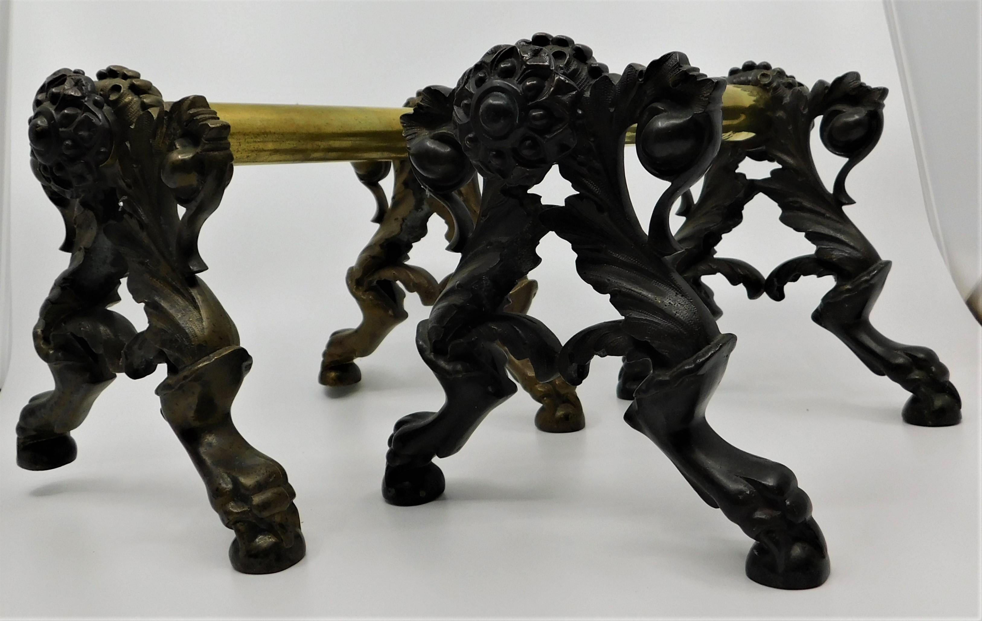 American pair of ornate fireplace tool rests/holders, circa 1890 for being able to lay the hearth set above ground level.