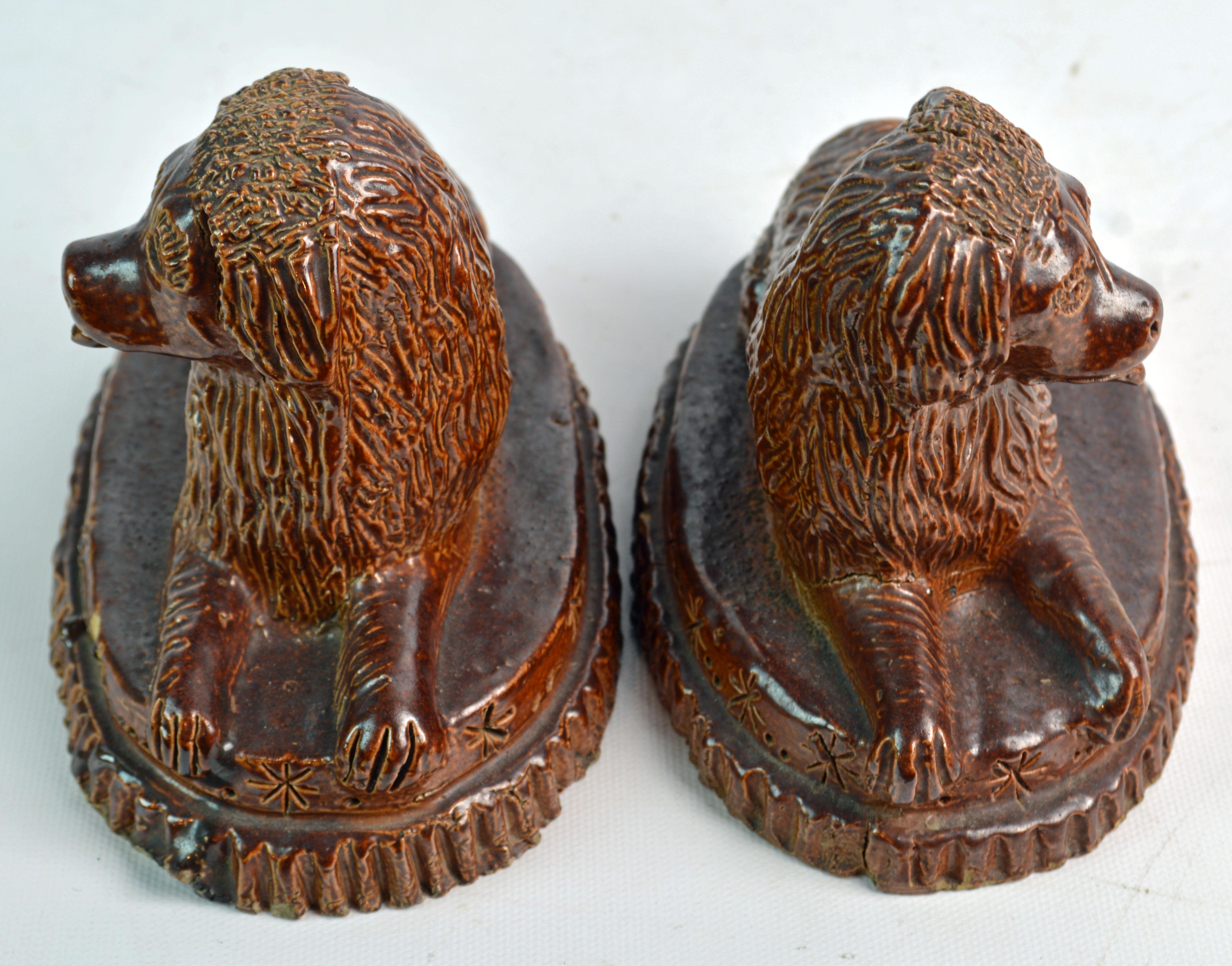 Pair of 19th Century American Yellow Ware Recumbent Spaniels on Oval Plinths 4