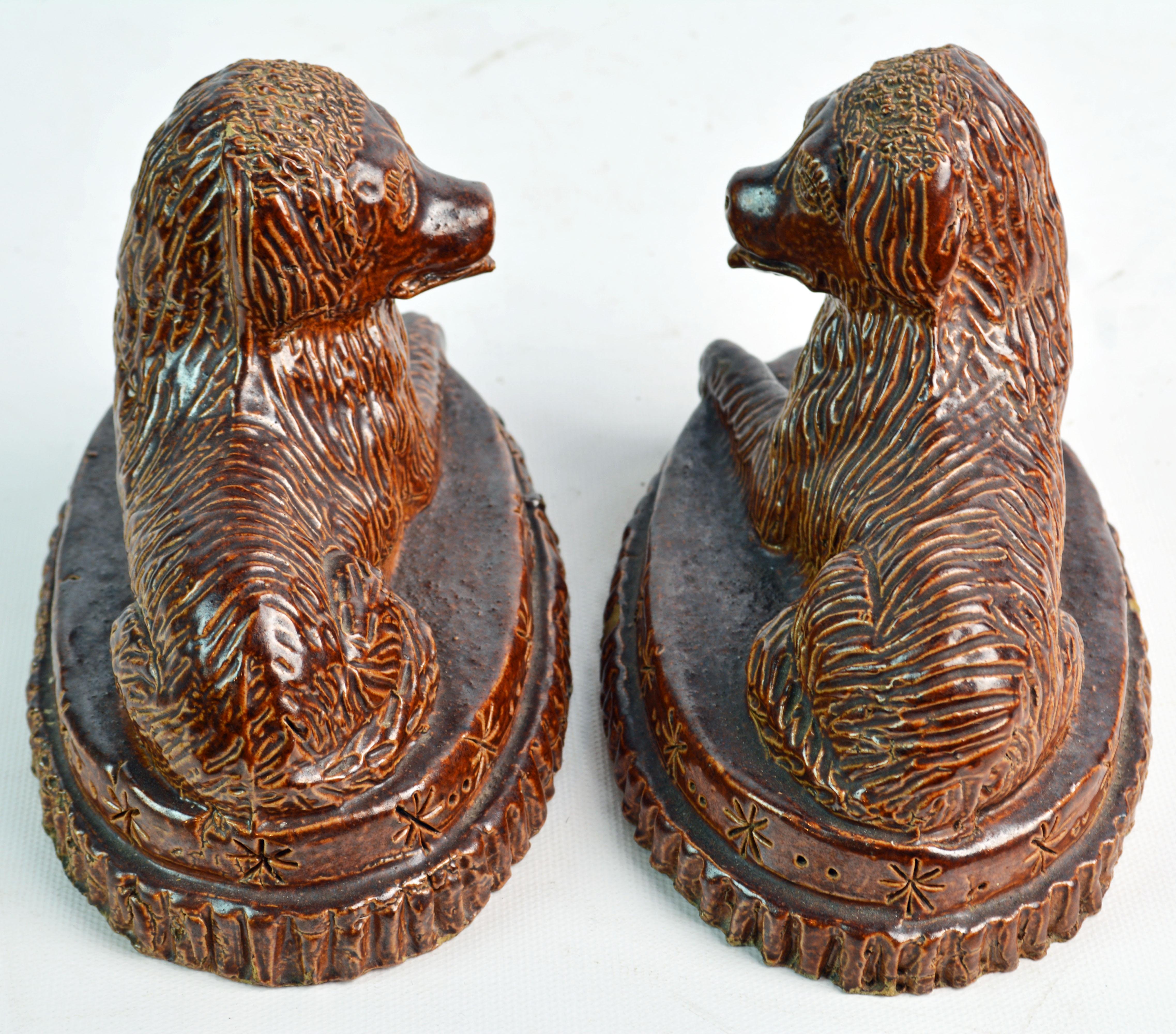 Pair of 19th Century American Yellow Ware Recumbent Spaniels on Oval Plinths 5