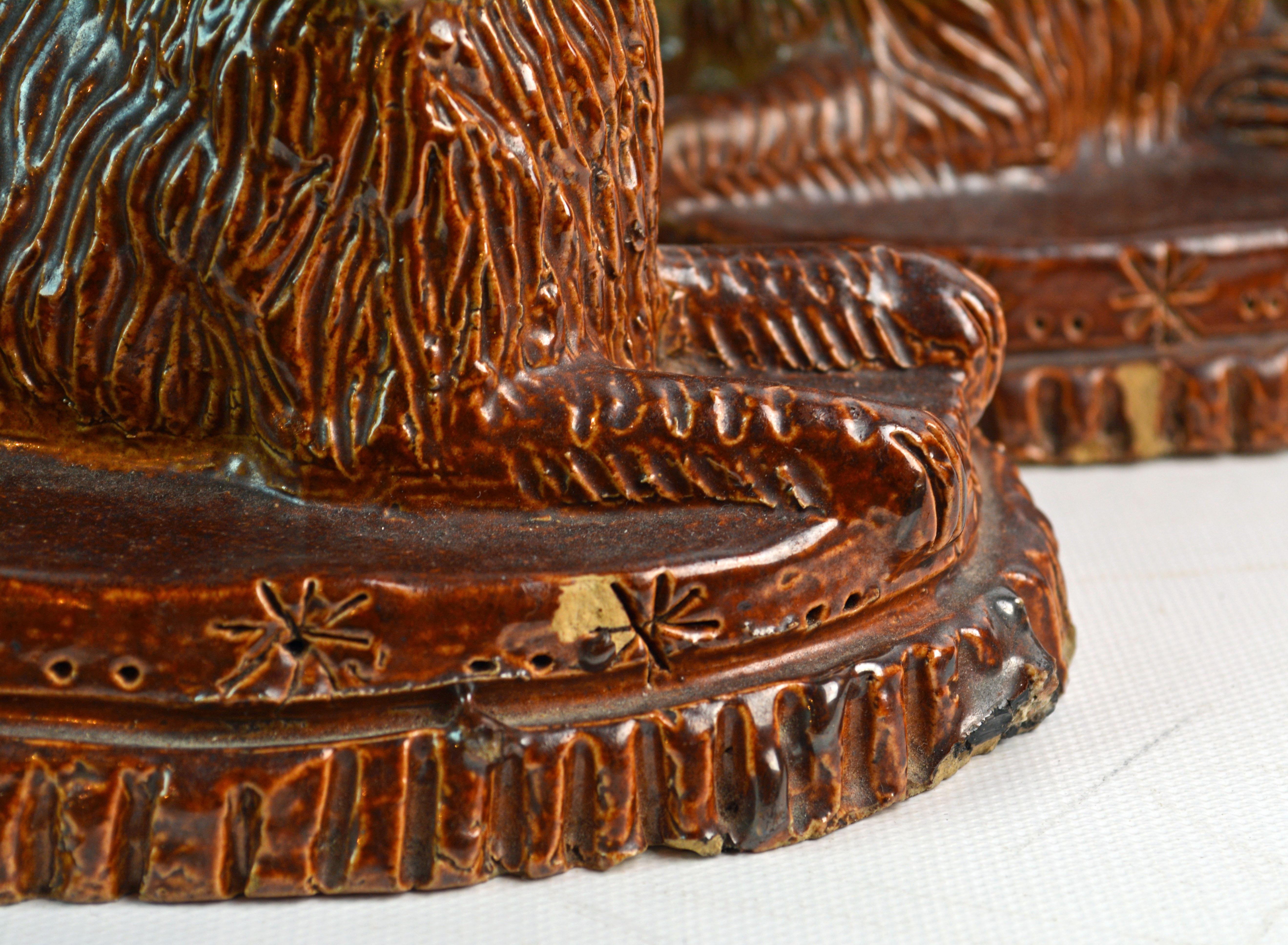 Pair of 19th Century American Yellow Ware Recumbent Spaniels on Oval Plinths 2