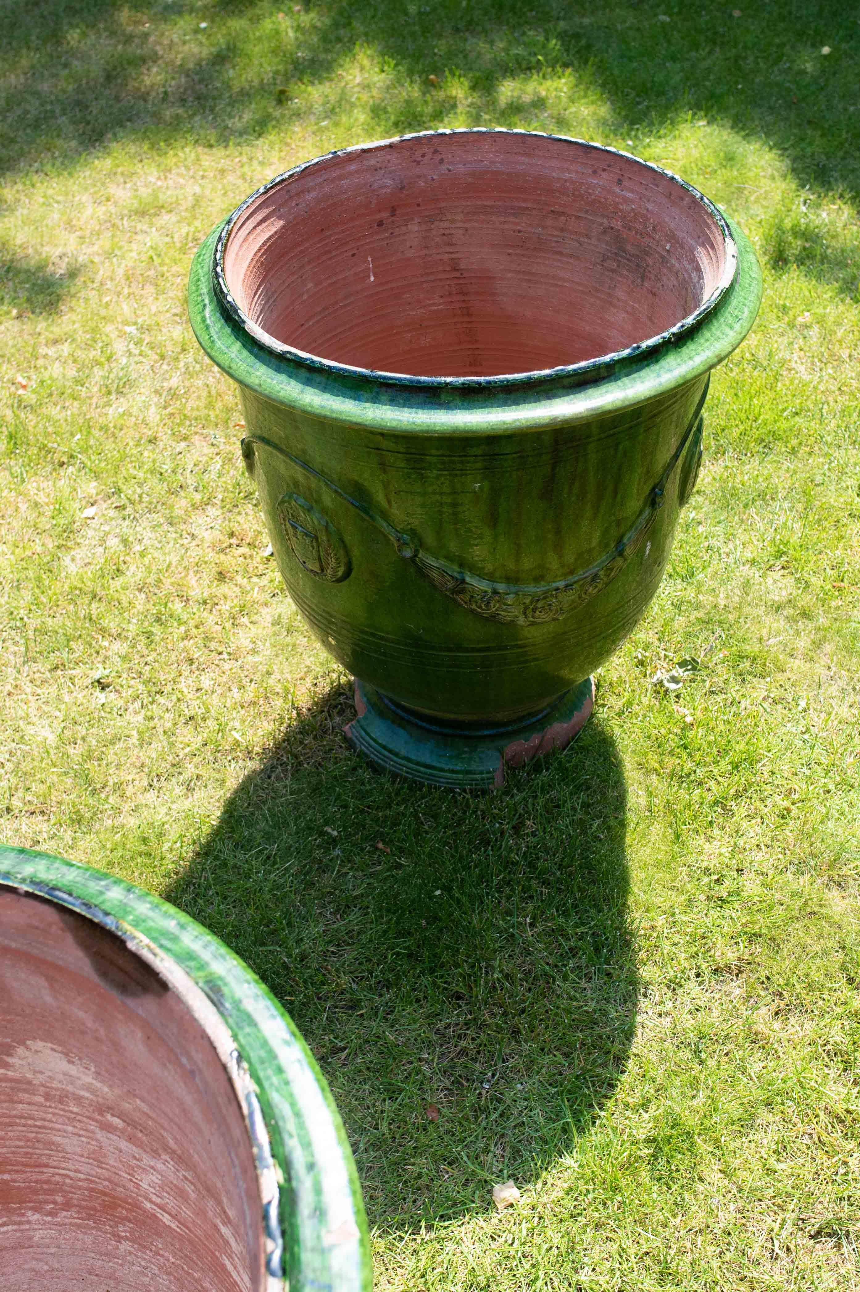 French Pair of 19th century Anduse pots in green ‘emaille’ by Poterie de la Madeleine For Sale
