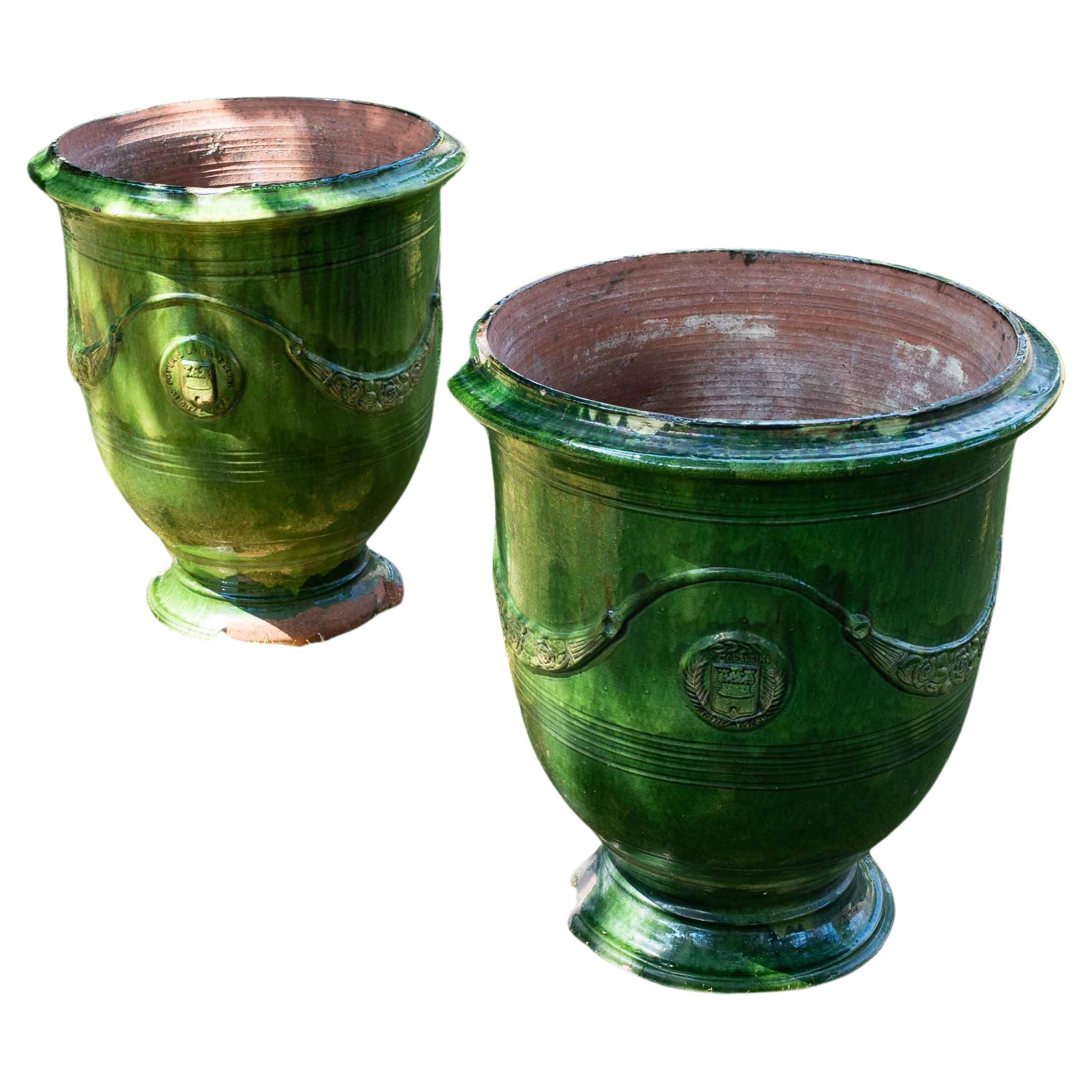 Pair of 19th century Anduse pots in green ‘emaille’ by Poterie de la Madeleine For Sale