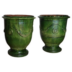 Pair of 19th century Anduse pots in green ‘emaille’ by Poterie de la Madeleine
