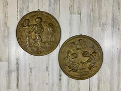 Pair of 19th Century Angels at Work Brass Repousse Decorative Rounds