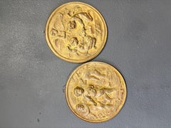 Pair of 19th Century Angels at Work Brass Repousse Decorative Rounds