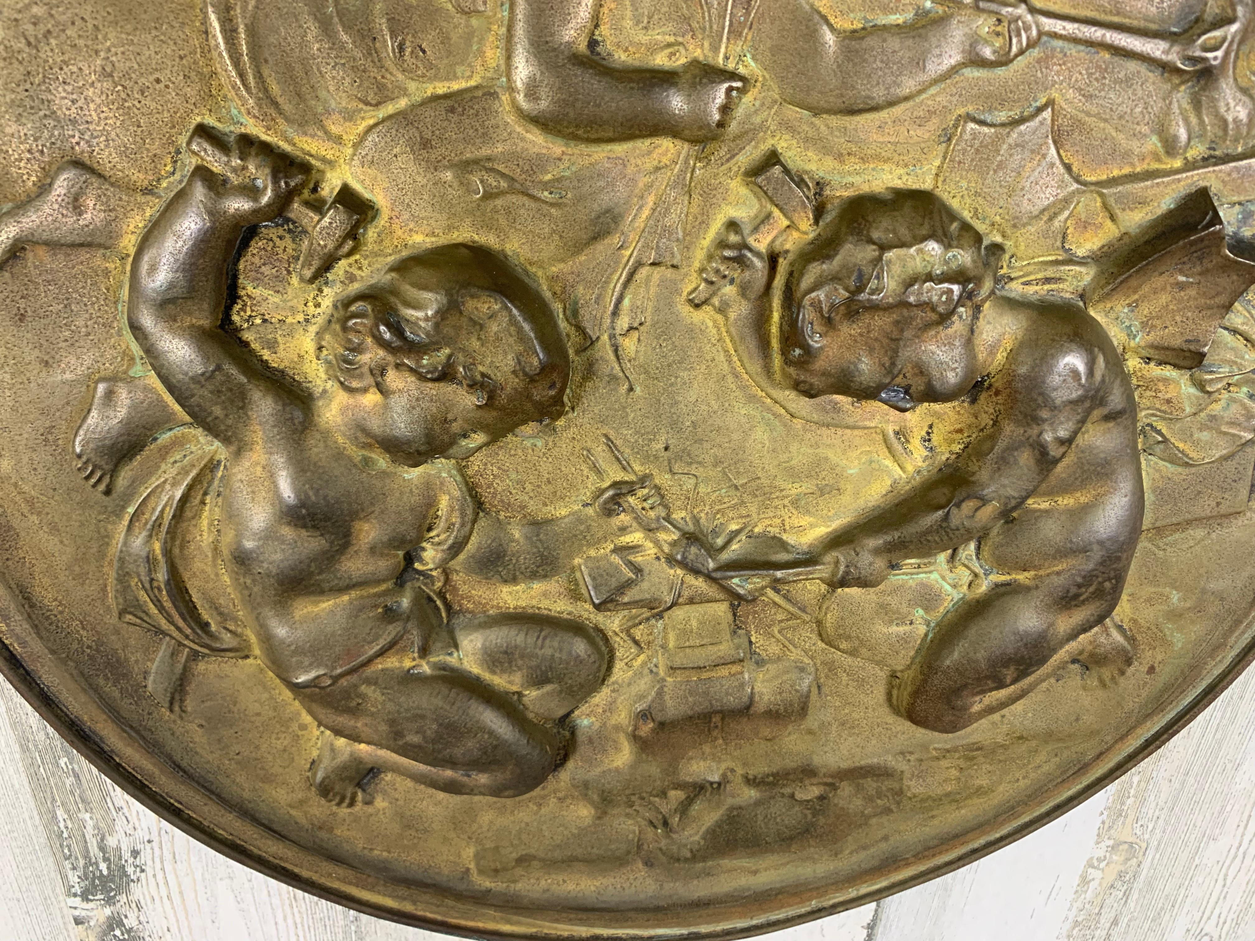 Pair of 19th Century Angels at Work Brass Repousse Decorative Rounds For Sale 2