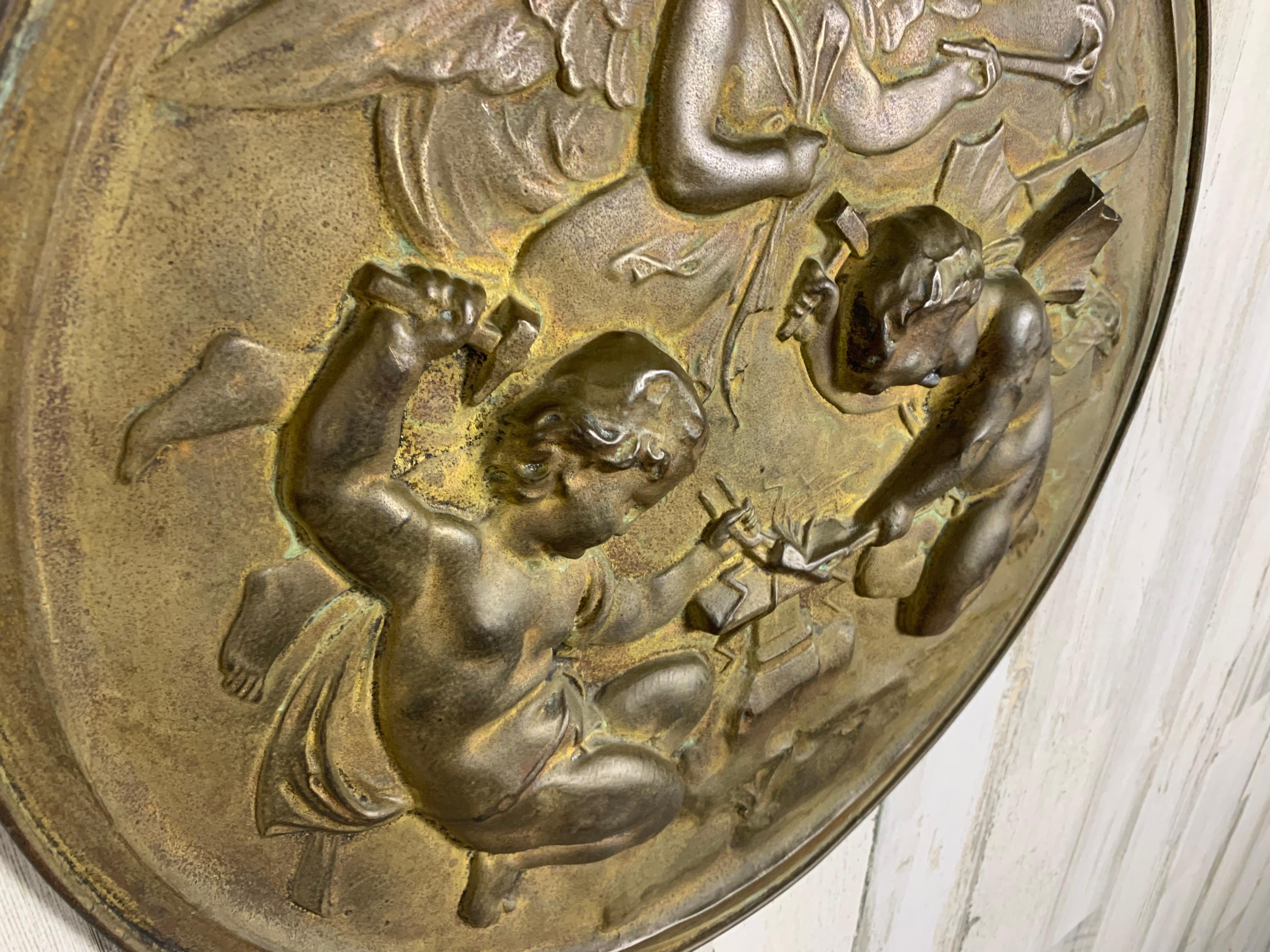 Pair of 19th Century Angels at Work Brass Repousse Decorative Rounds For Sale 3