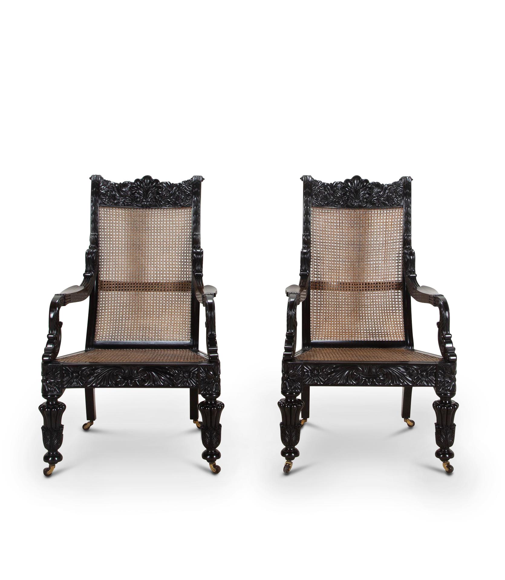 Caning Pair of 19th Century Anglo-Indian Ebony Chairs For Sale