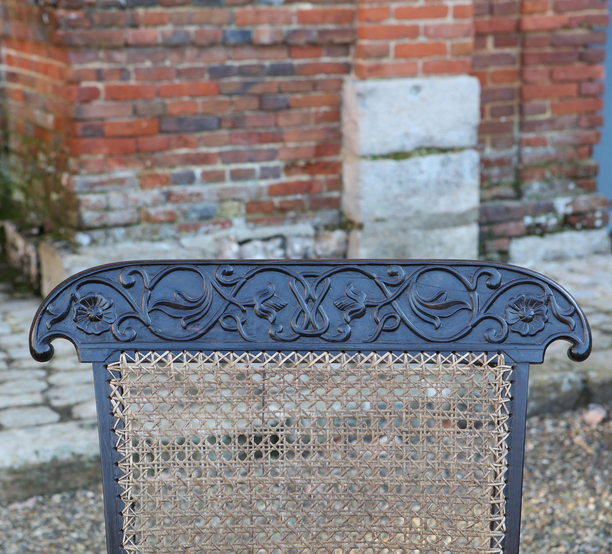 Sri Lankan Pair of 19th Century Anglo-Indian Solid Ebony Caned Armchairs