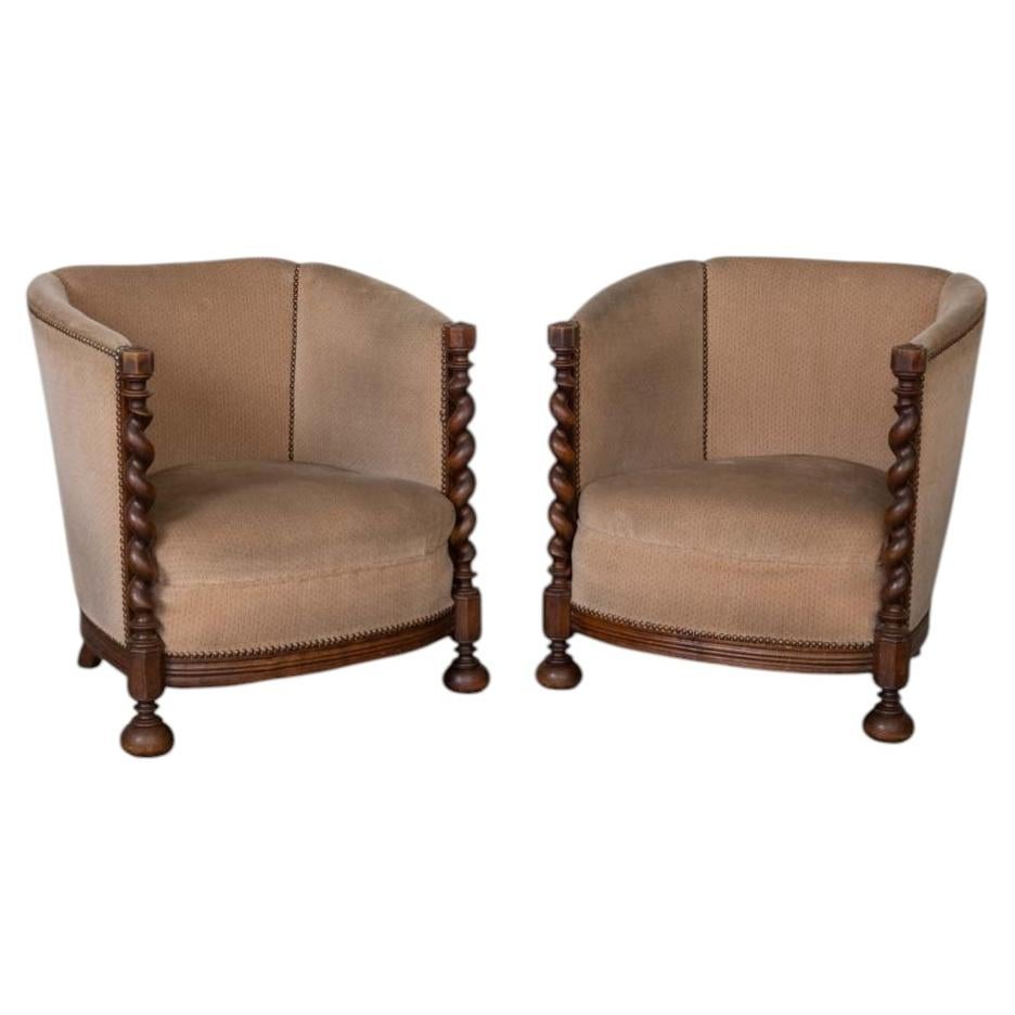 Paire de fauteuils anciens du XIXe siècle à accoudoirs torsadés