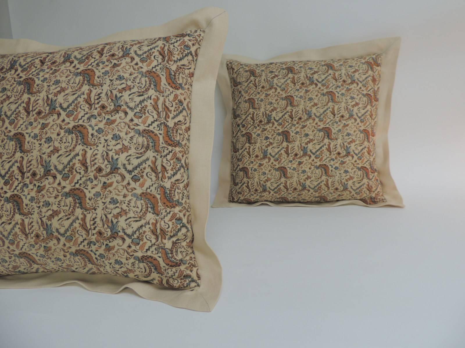 Pair of Arts & Crafts square floral printed linen decorative pillows with A.T.G. custom linen flange. Throw pillows handcrafted with a 19th century textile in shades of soft yellow linen same as backing. Color palette in the antique yellow textile