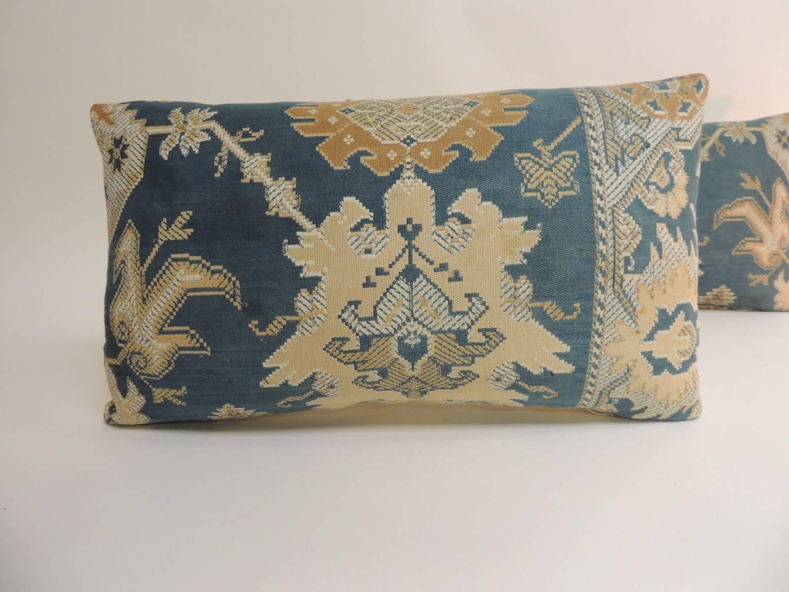 Pair of 19th century Arts & Crafts tan and blue decorative lumbar pillows
Pair of vintage 19th century Arts & Crafts decorative lumbar pillows handcrafted with a tan and blue textile. Pair of woven floral pillows (tapestry) like textile. Decorative