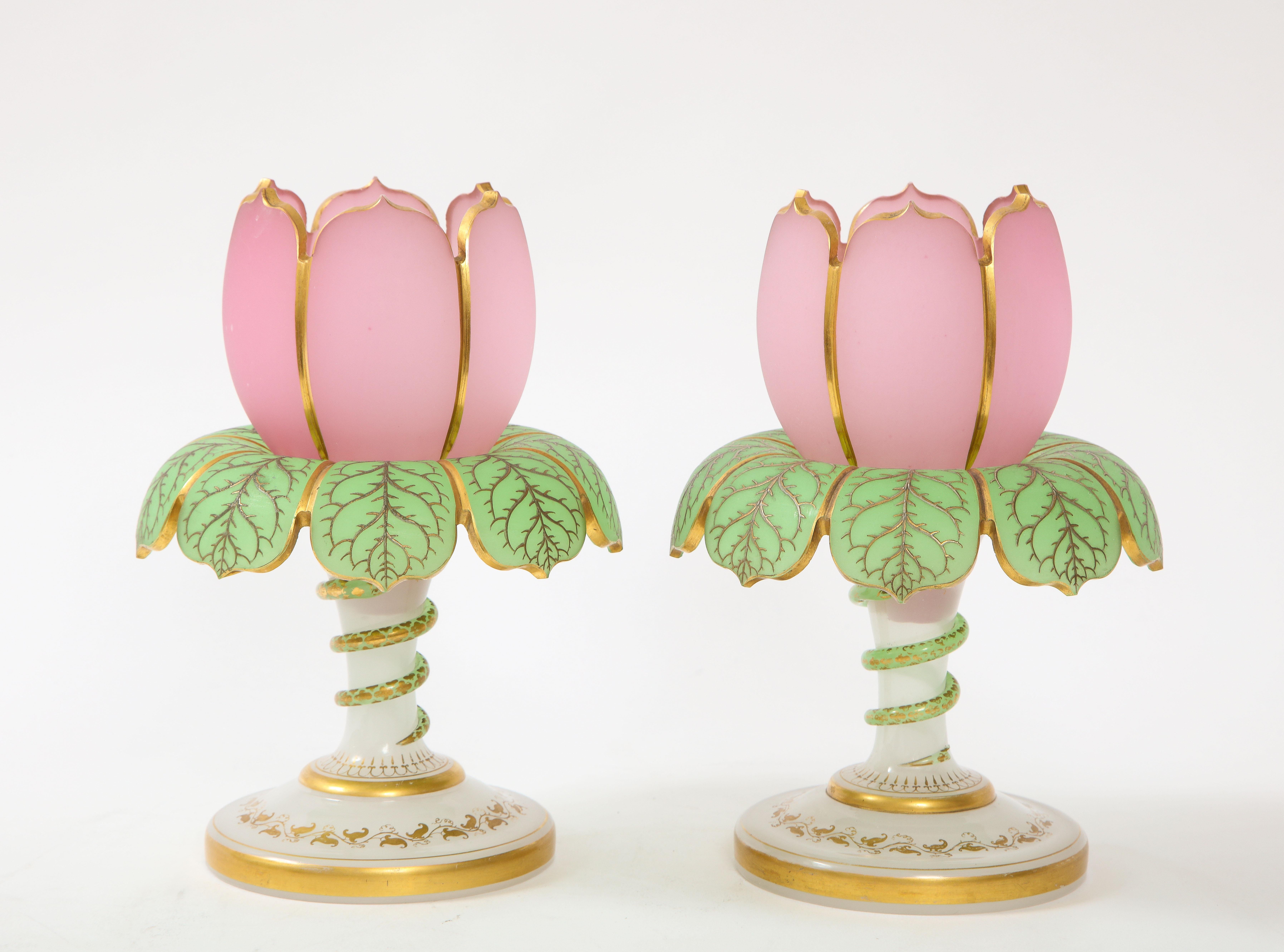 A fabulous and quite rare fantastic condition pair of 19th century baccarat tulip form 3 color opaline vases/ candle holders with serpent decor. The tops of each of the vases are made of pink opaline Baccarat crystal and are finished in 24K brushed