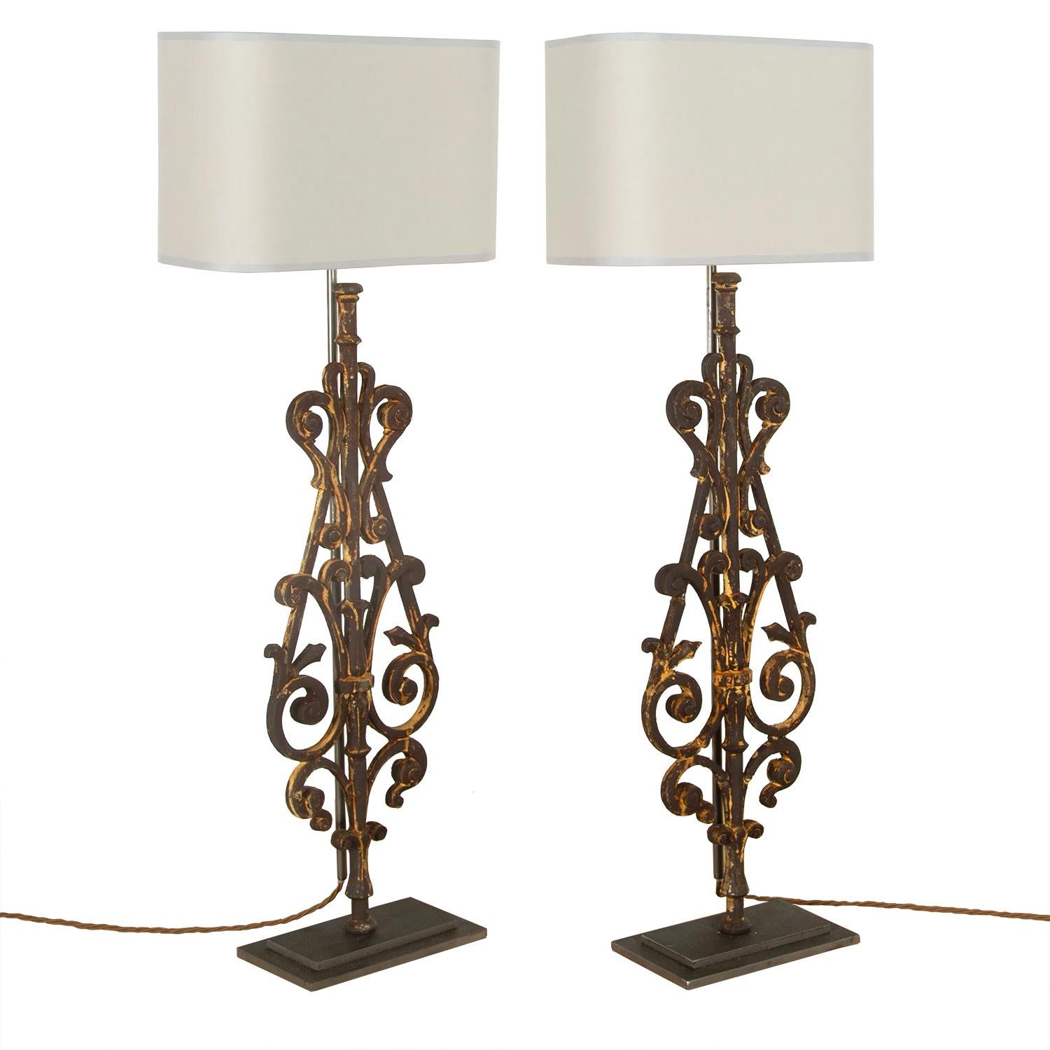 A decorative pair of lamps made in our artisan work shops using fragments of 19th century iron balustrade. This piece has been rewired and PAT tested to UK standards.
