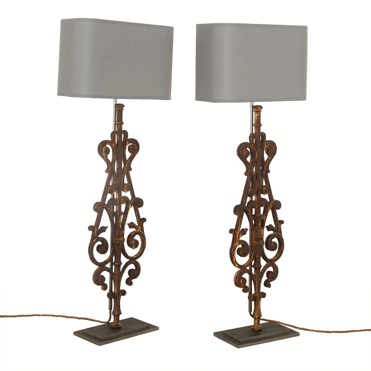 A decorative pair of lamps made in our artisan work shops using fragments of 19th century iron balustrade. This pieces has been rewired and PAT tested to UK standards.
  