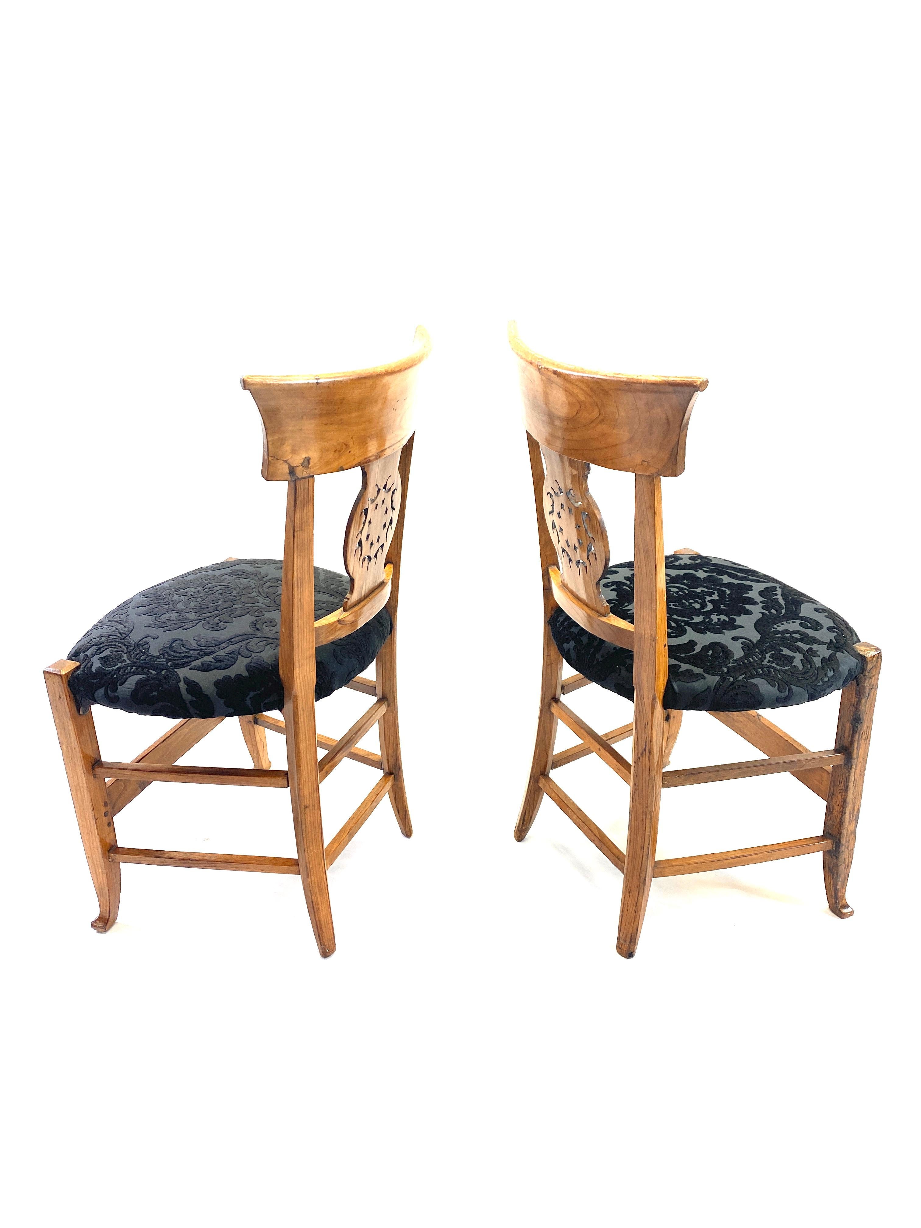 A handsome pair of 19th century walnut Biedermeier chairs.