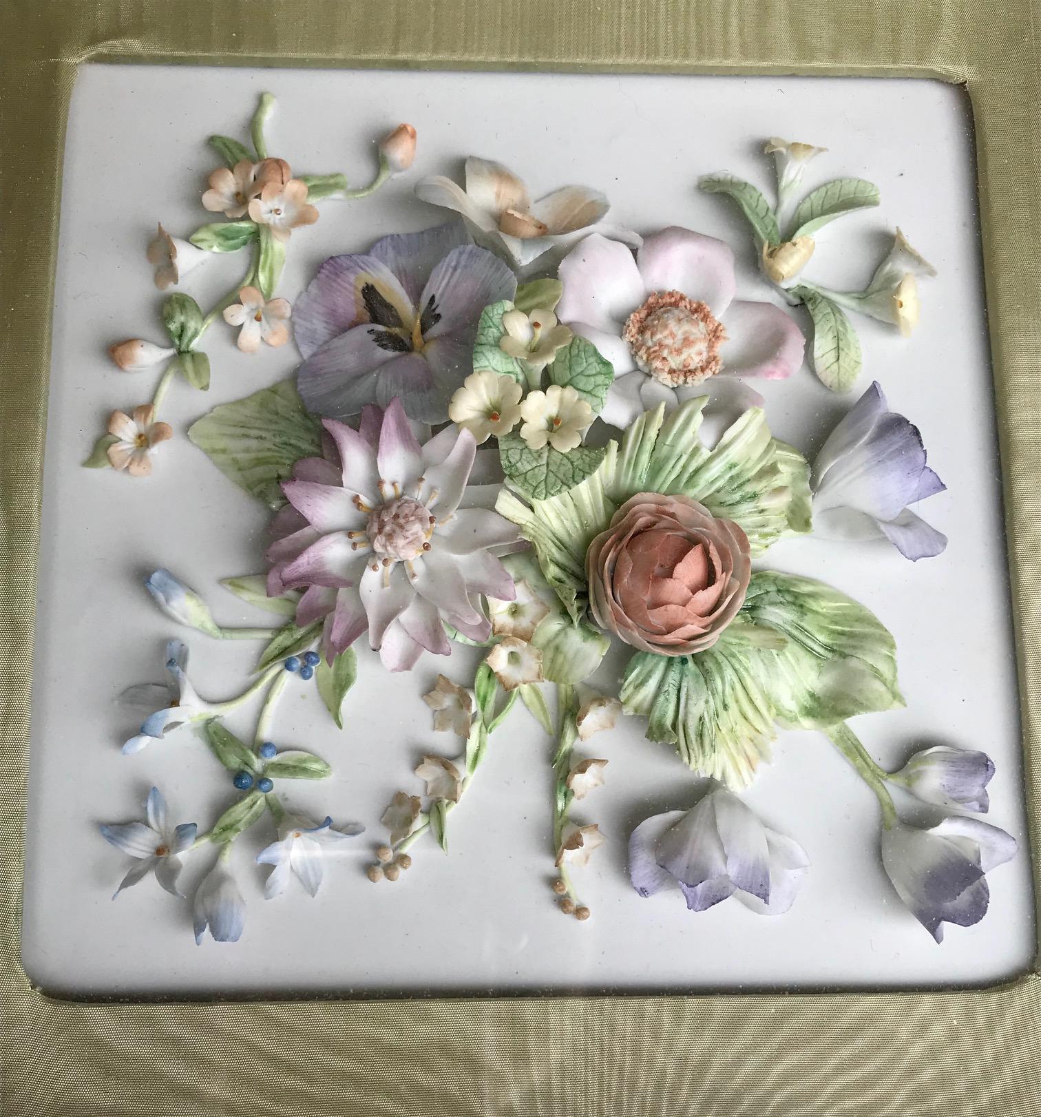 This is a pair of the finest 19th century German bisque porcelain plaques, circa 1870. Masterfully sculpted floral bouquets in three dimensions. Each one is uniquely created and extraordinary in detail and quality. 

Both pieces are in pristine