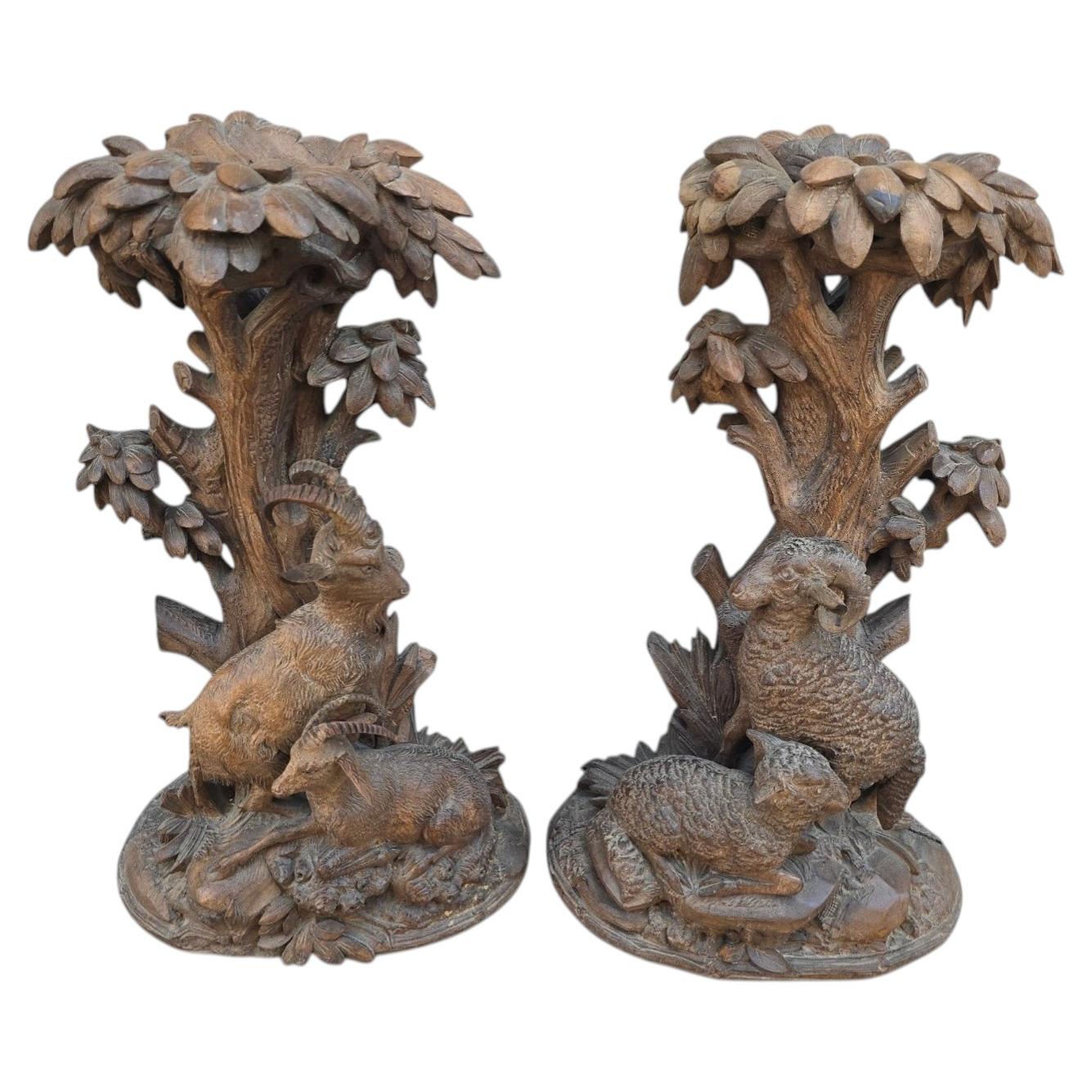 Paire de chandeliers de chasse en bois sculpté Black Forest du 19e siècle