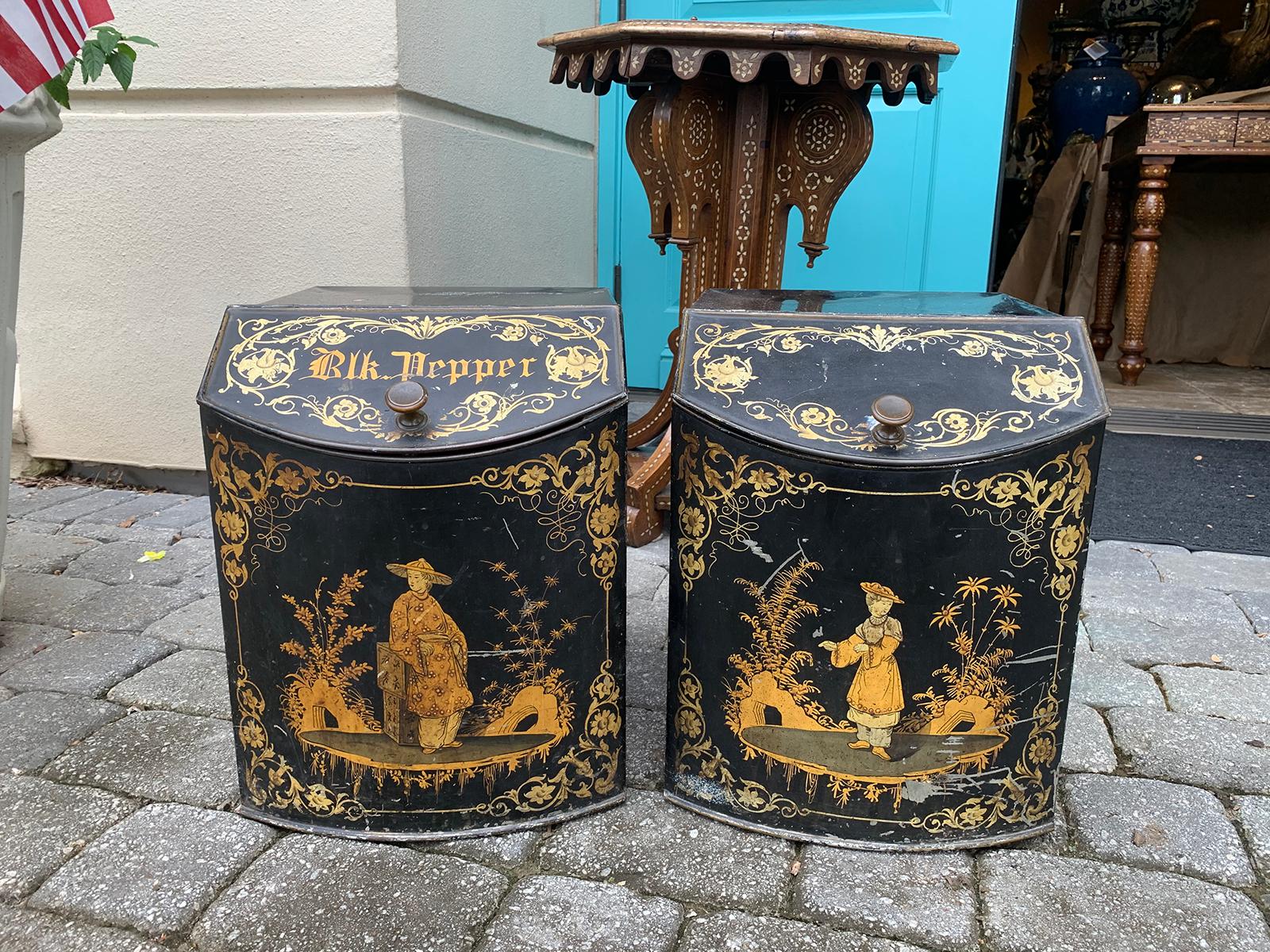 Pair of 19th century black and gilt chinoiserie tole tea/spice boxes, hinged lids.