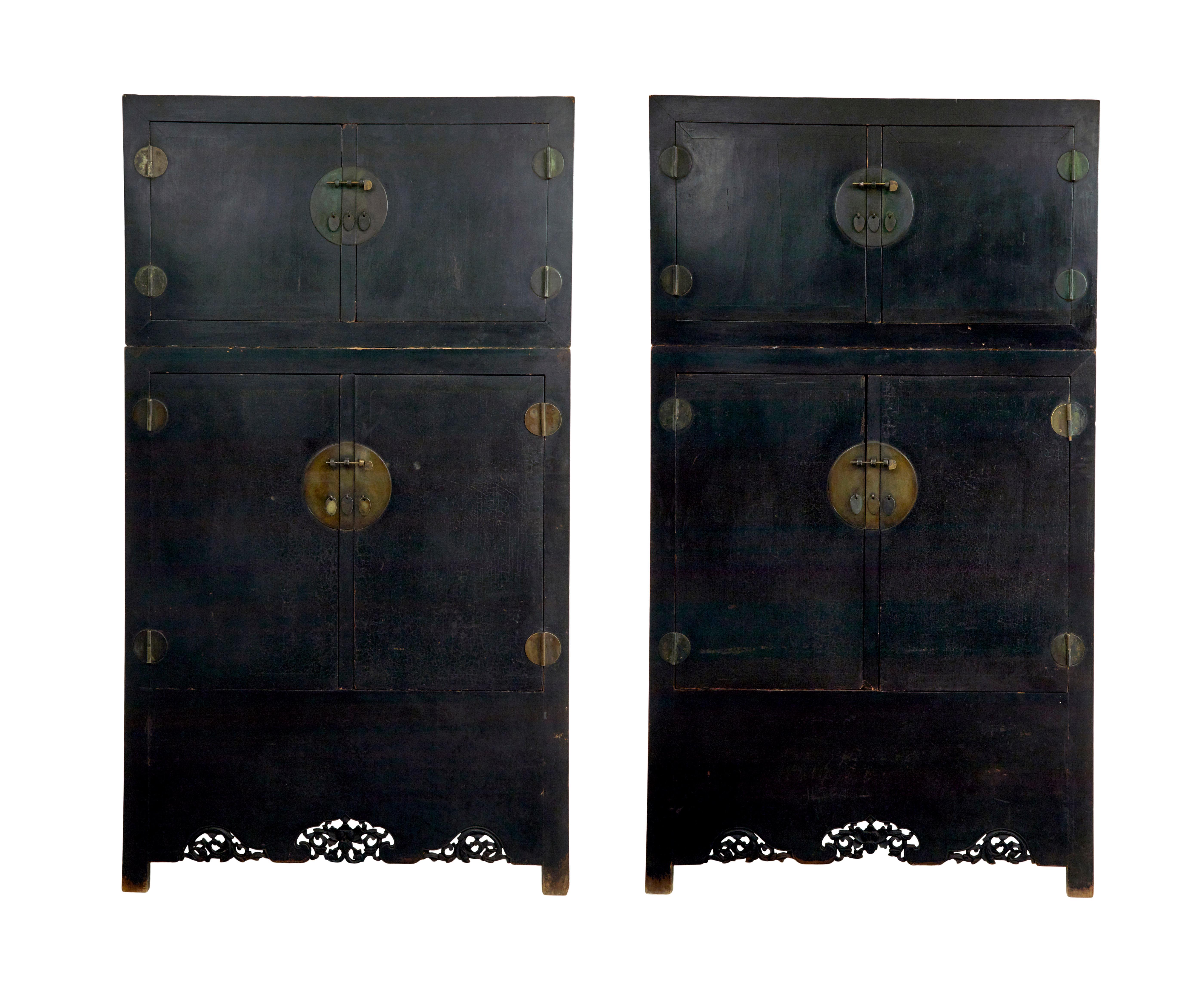 Pair of 19th century black lacquered Chinese compound cabinets circa 1840.

Fine pair of Qing-dynasty compound cabinets, in the Ming style.  Complete in their original blackened matt lacquer, which has taken on a lovely craquelure and light fading