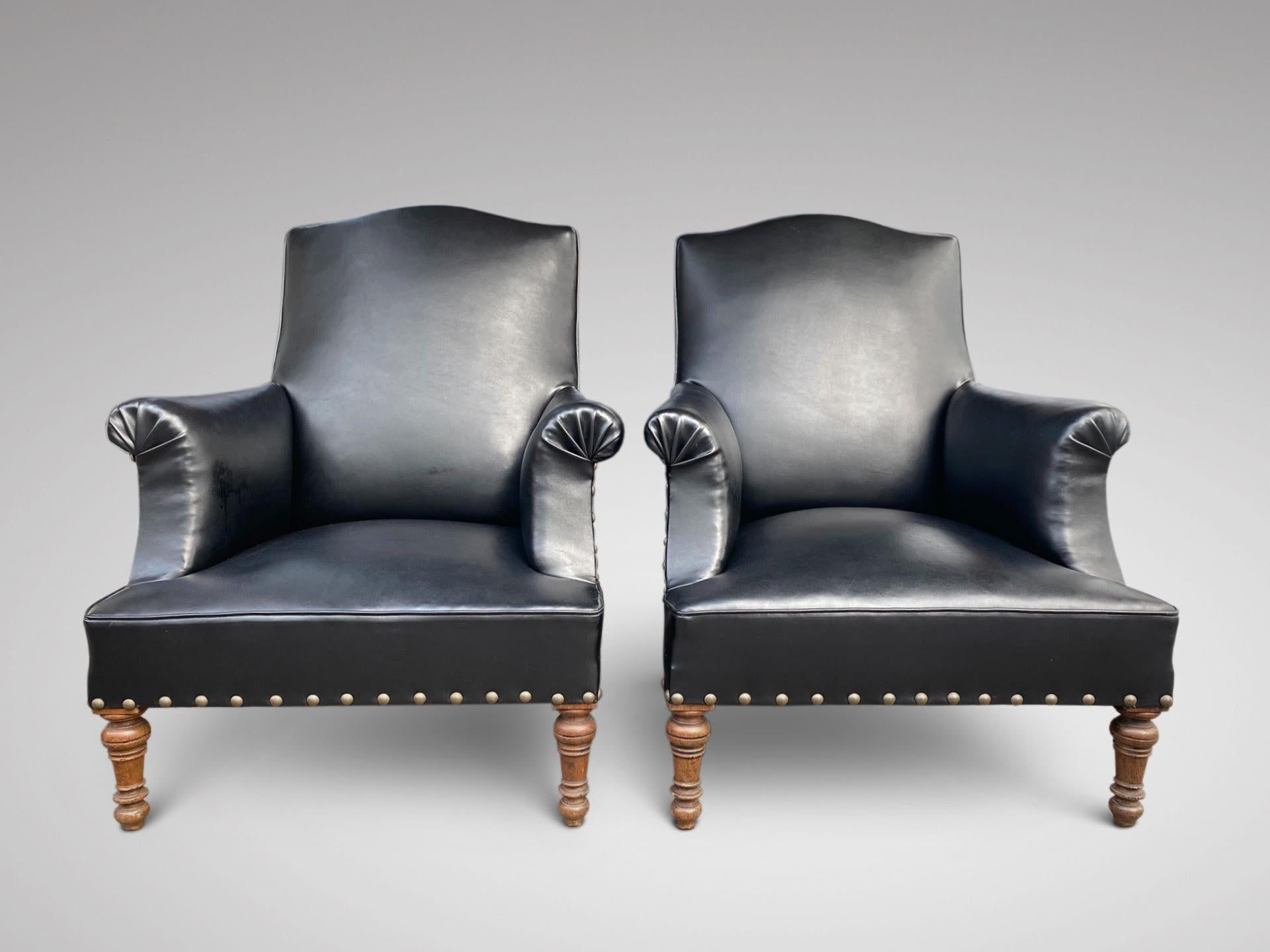 We are delighted to offer for sale this large and very comfortable pair of Napoleon III antique French library armchairs. Quality black leather and studded on the front & back edges, standing on turned oak legs. Late 19th century.

Measures: