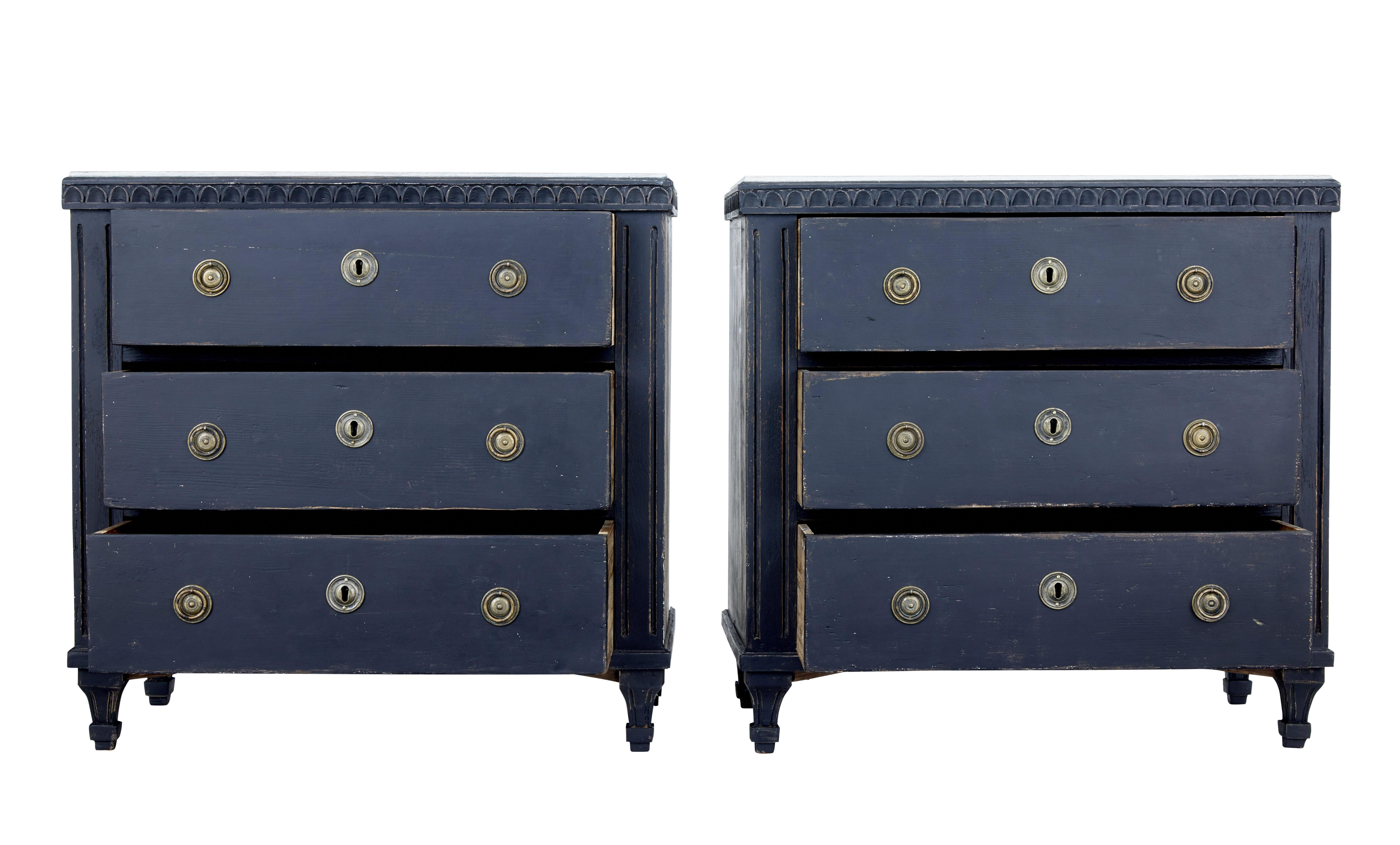 Pair of painted Swedish commodes circa 1870.

Each chest with 3 drawers fitted with brass hardware, working key and locks.

Contrasting grey hand painted faux marble top surface, with scalloped edge. Later black paint which has since faded to