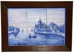 Pair of 19th Century Blue and White Painted Faience Delft Tiles in Oak Frames