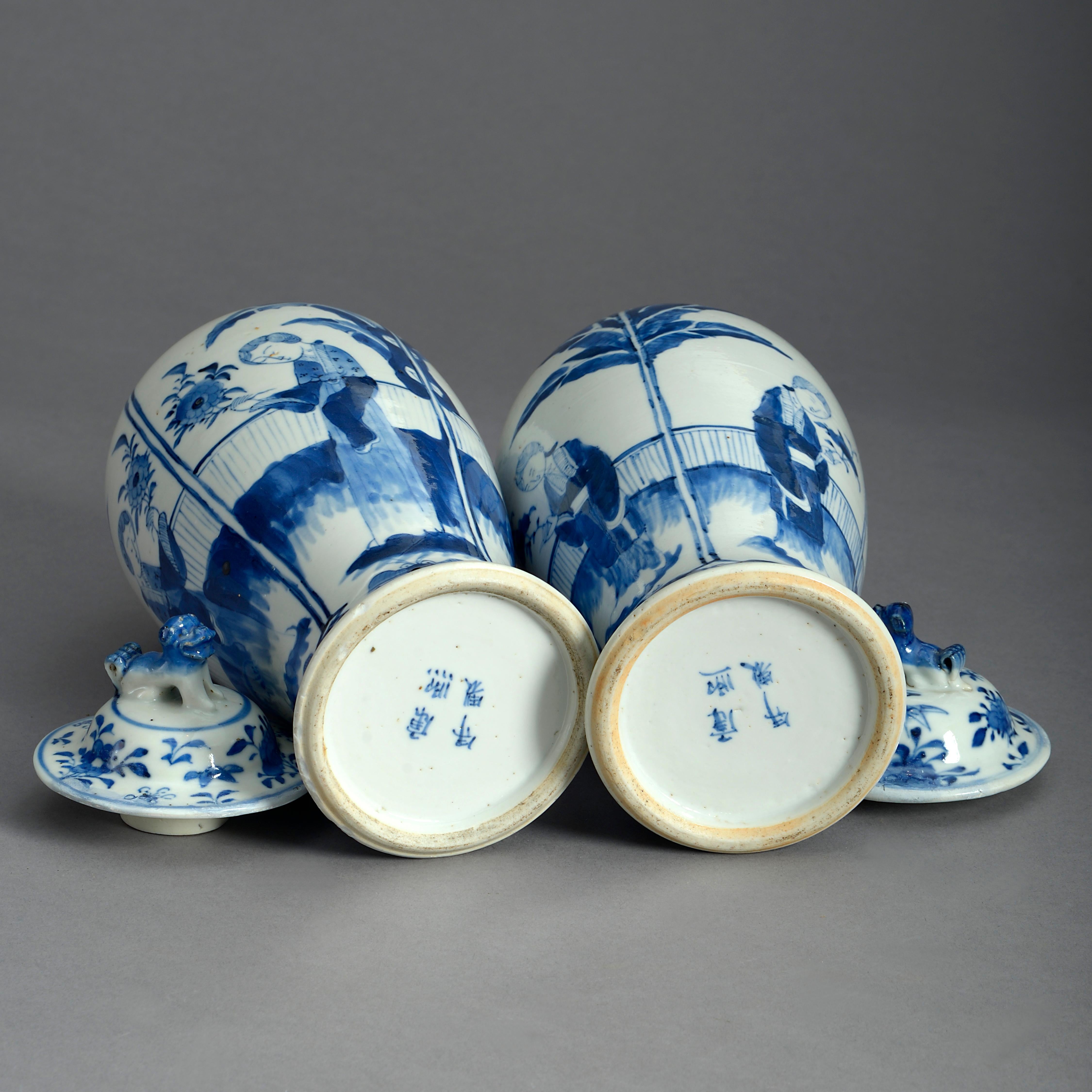 Chinese Pair of 19th Century Blue and White Porcelain Vases and Covers in the Kangxi Tas