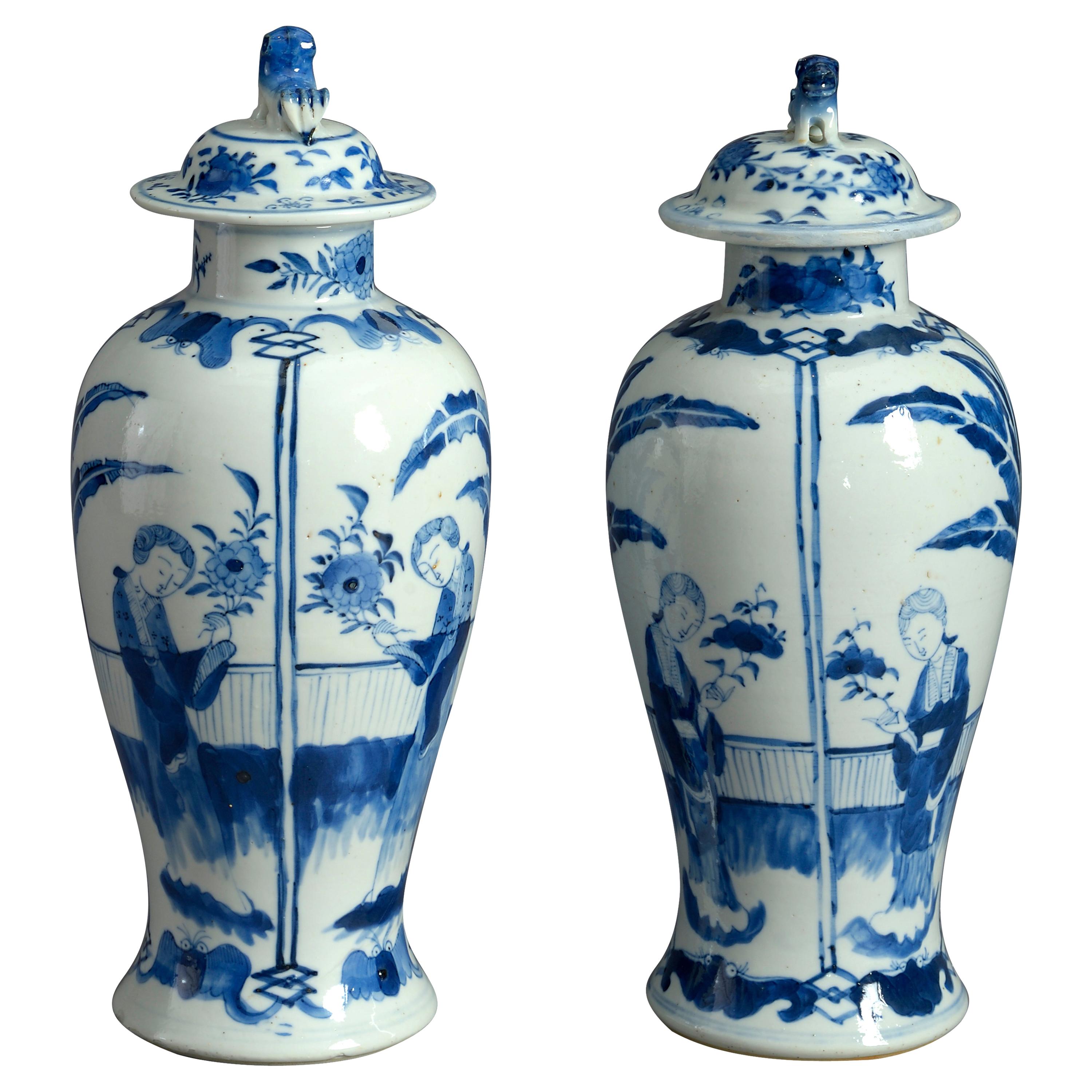 Pair of 19th Century Blue and White Porcelain Vases and Covers in the Kangxi Tas