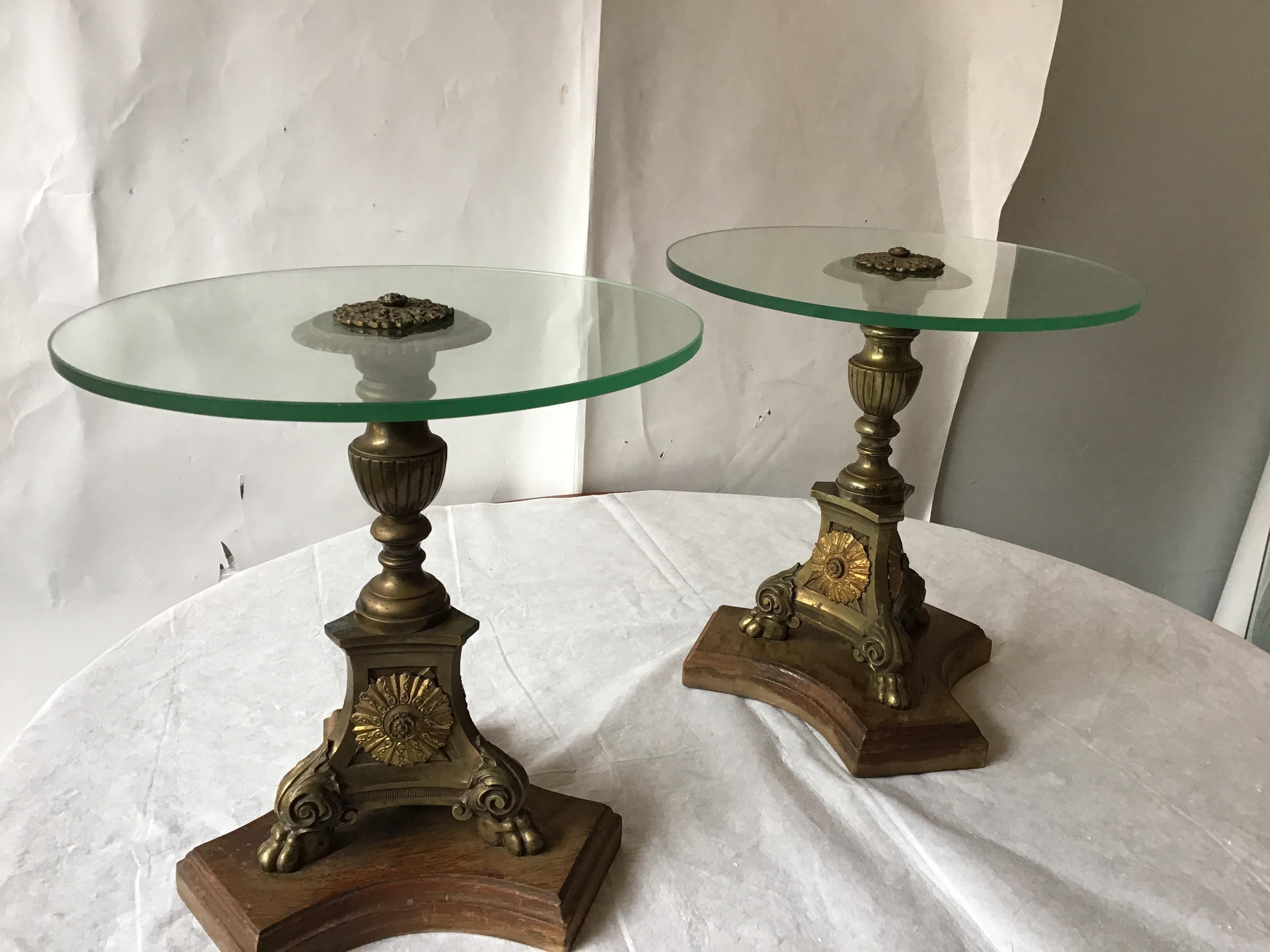 Pair of 19th century brass church candlesticks, that were turned into side tables on custom wood bases.