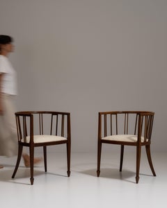 Pair of 19th Century British Chestnut Brown Sheraton Upholstered Tub Chairs