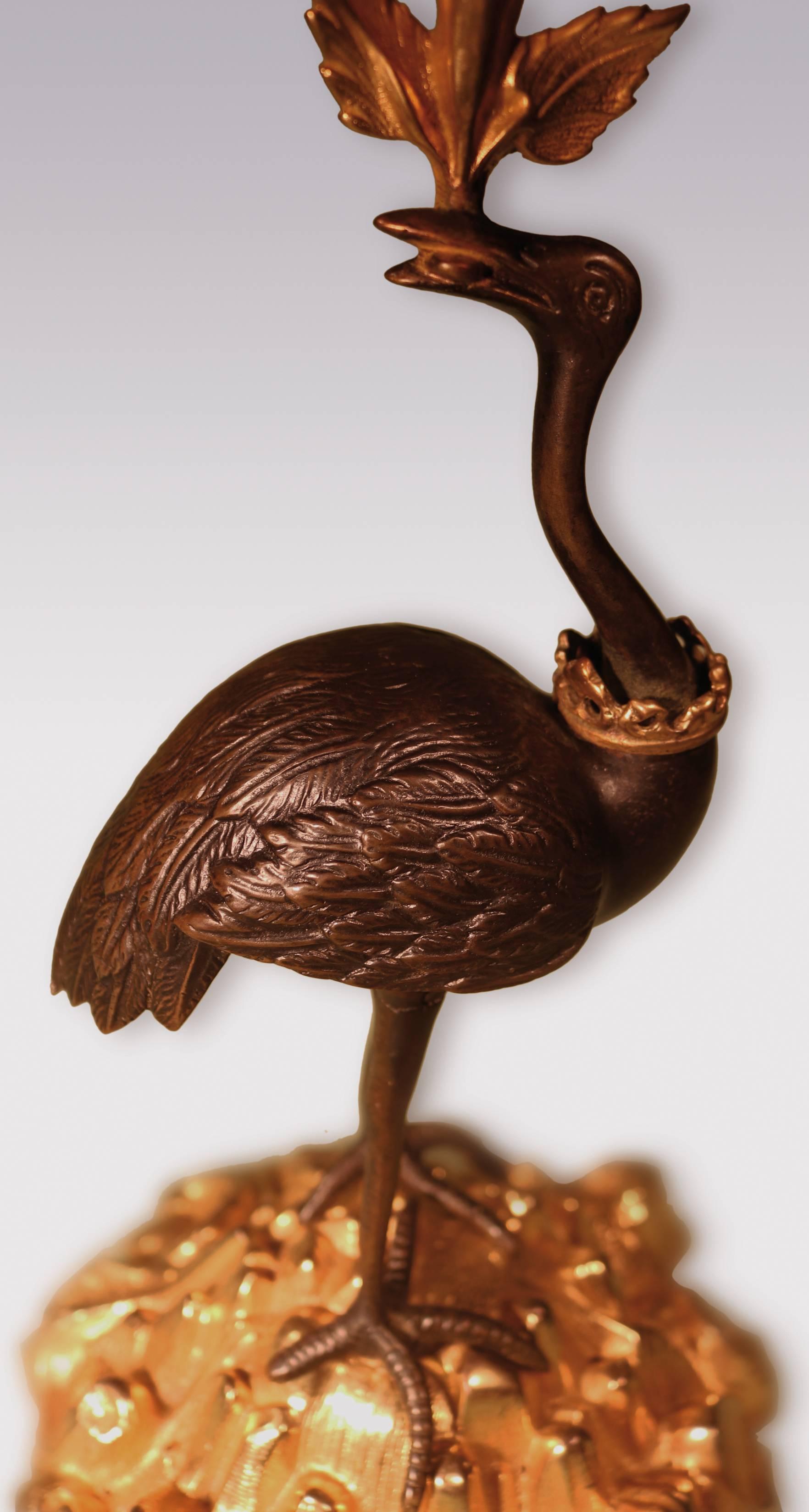 English Pair of 19th Century Bronze and Ormolu Candlesticks with Crowned Stork Stems