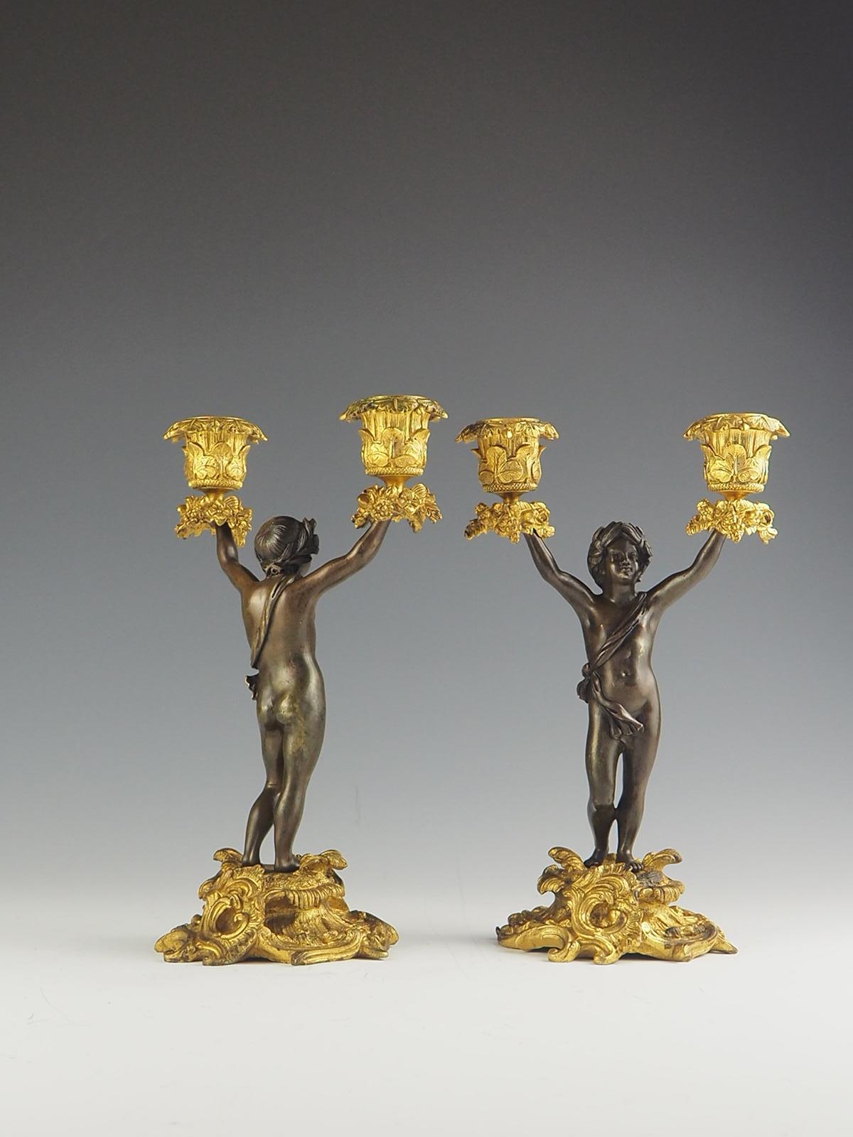 Pair of 19th Century Bronze and Ormolu Twin-Light Cherub Candelabra In Good Condition For Sale In Lincoln, GB
