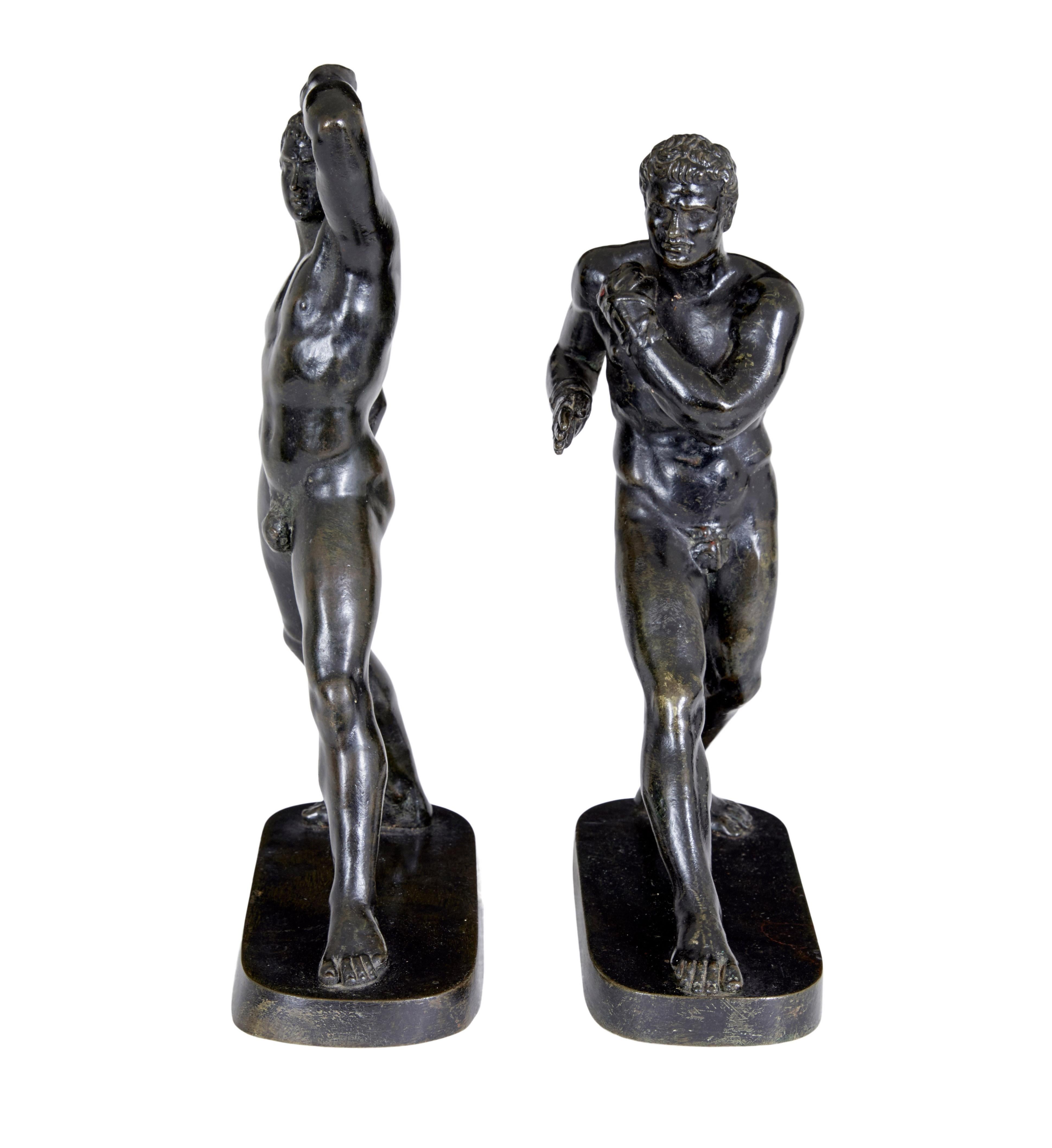 Pair of 19th century bronze athlete figures after Canova circa 1880.

Good quality pair of decorative bronzes with good patina.  Showing 2 types of athletic poses, one of which is wearing strap protection to his hands.

Very slight size