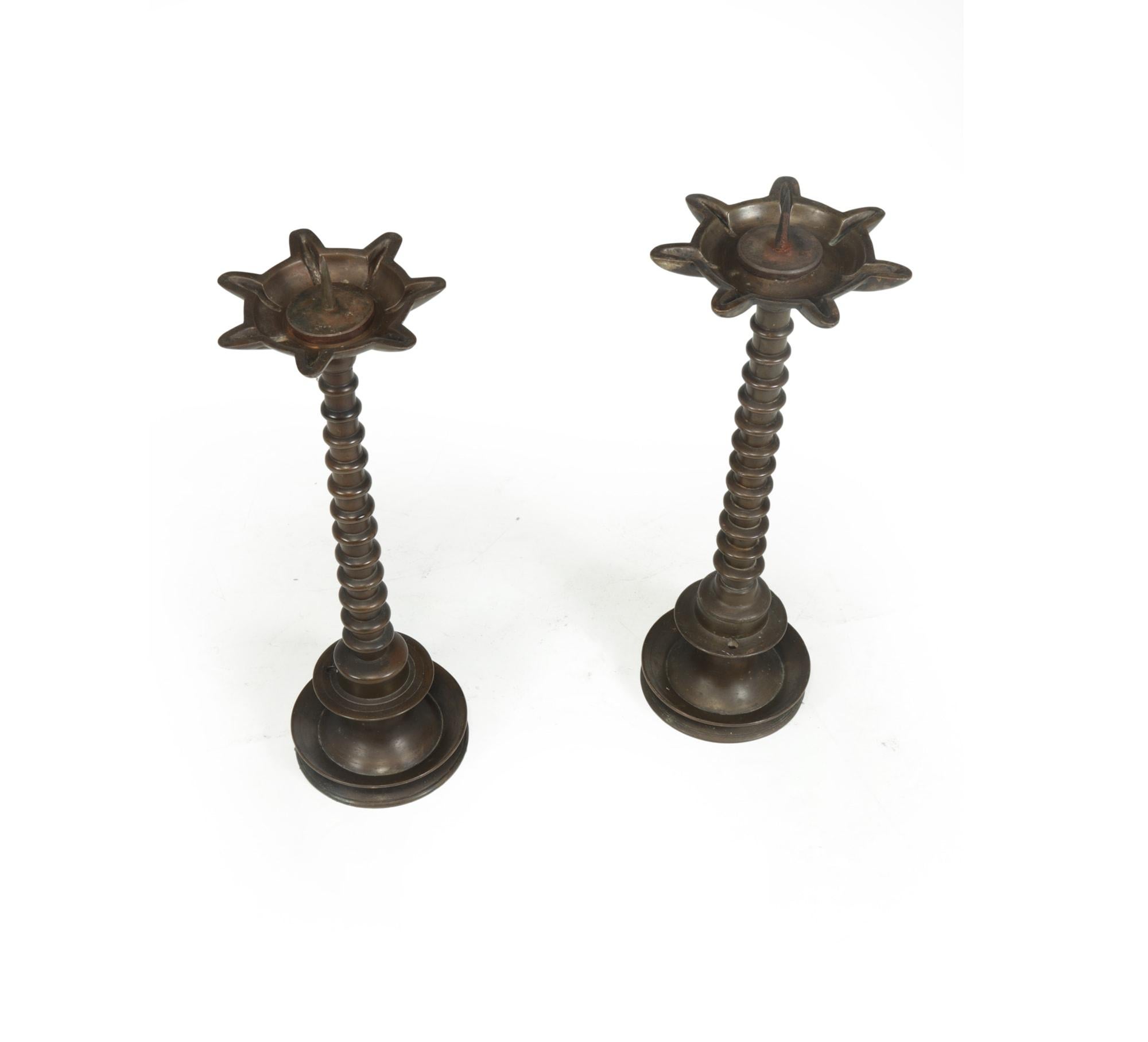Romantic Pair of 19th Century Bronze Bobbin Candlesticks For Sale