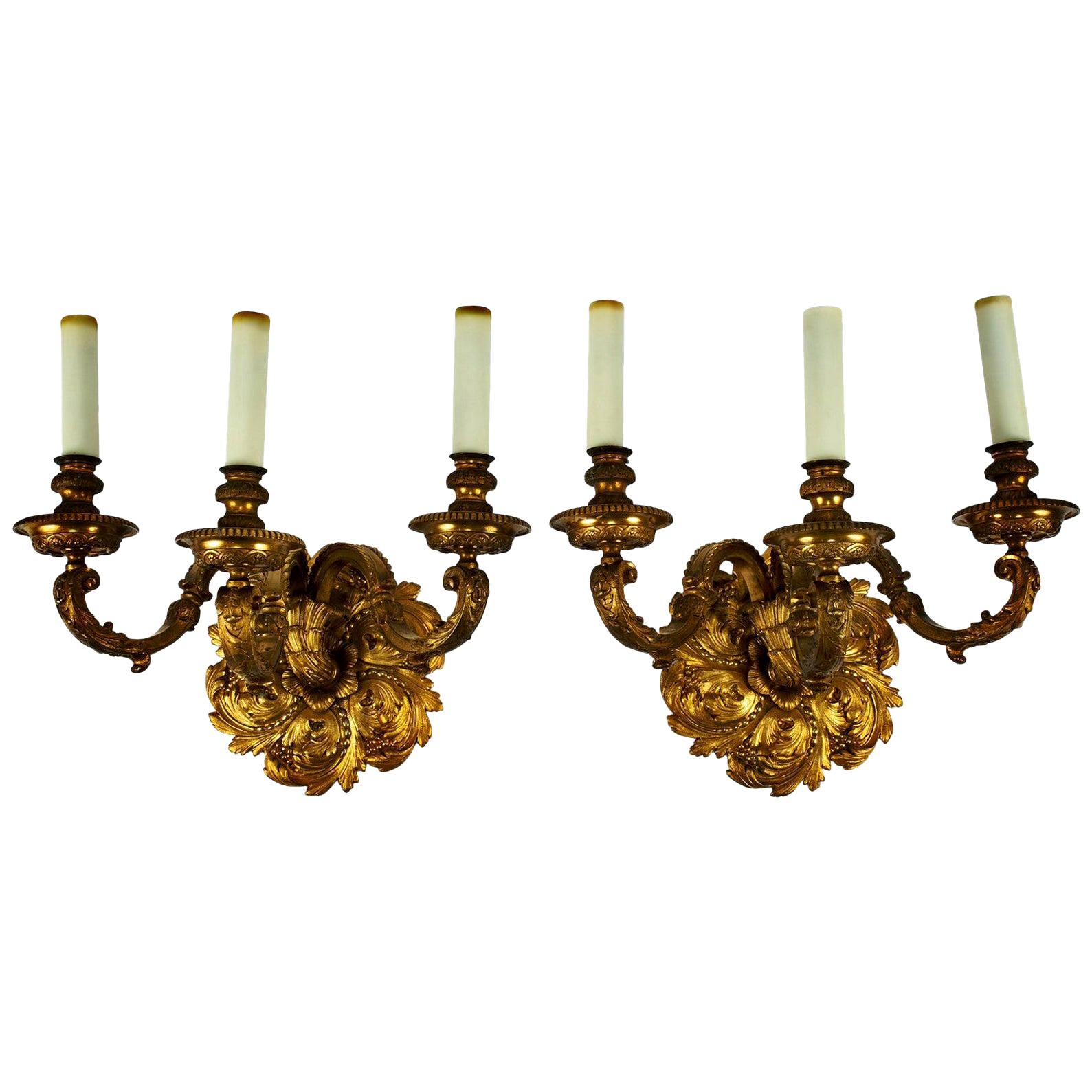 A massive pair of 19th century bronze doré sconces from France.