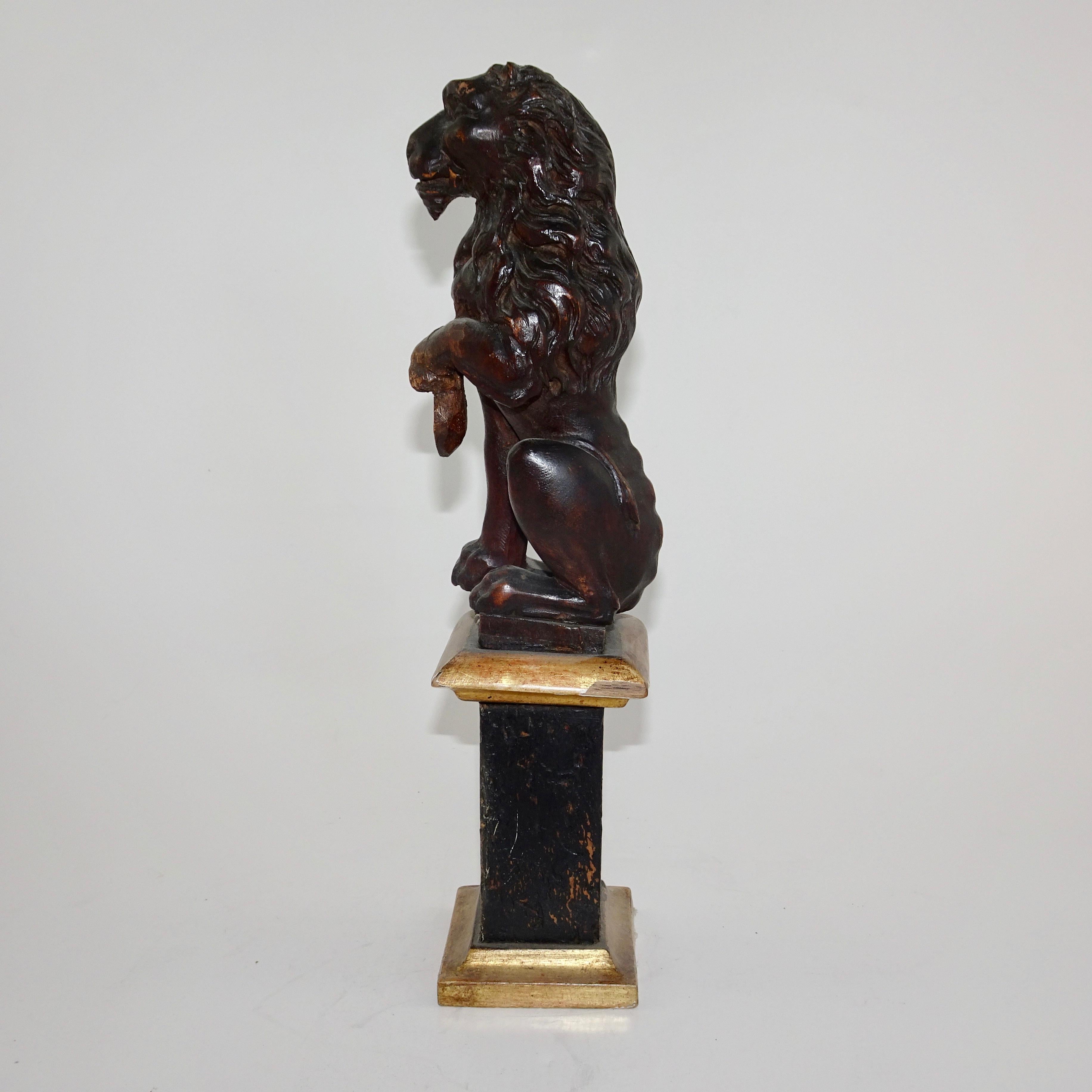 Bronze Pair of 19th Century Wood Carved Lion Statues on Faux Marble Bases For Sale